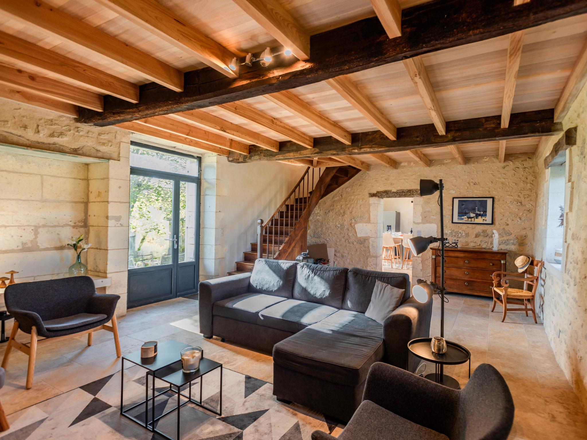 Bedroom with comfortable beds at Les Ecures 2 in Champagne et Fontaine