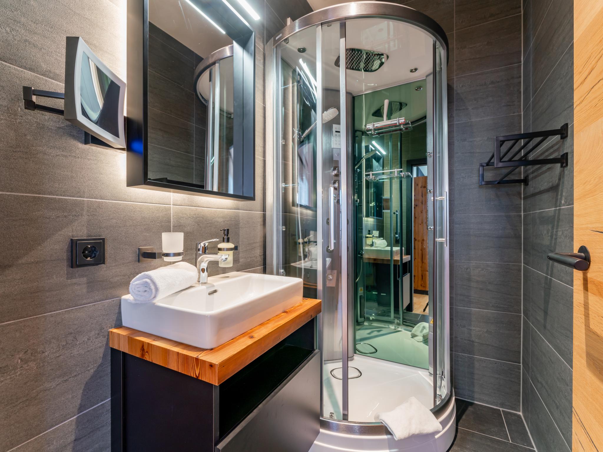 Bedroom with comfortable beds at Zirbenlodge Sonnenalpe Nassfeld Top B01 in Sonnenalpe Nassfeld