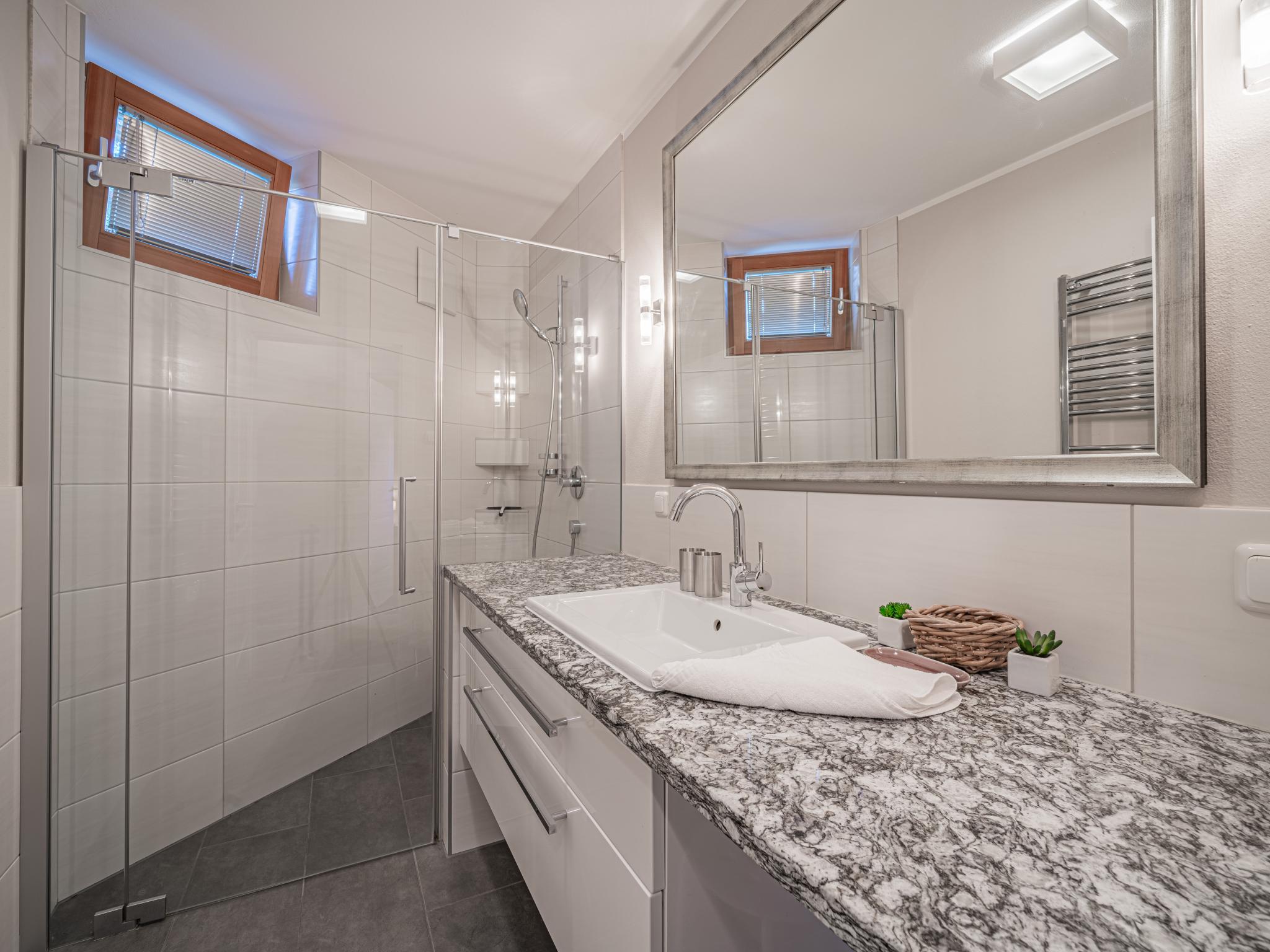 Bedroom with comfortable beds at Kitz Apartments Top 6 in Kitzbühel