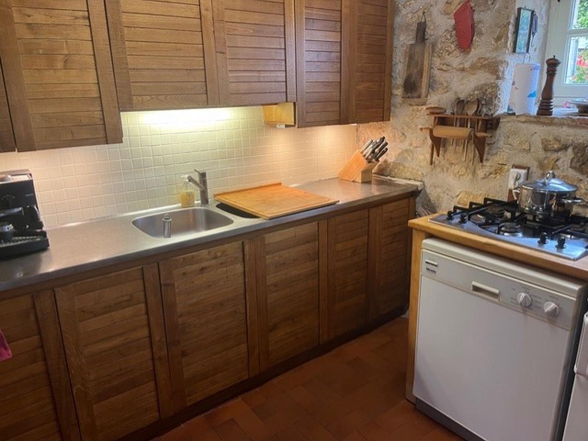 Modern kitchen at Ollie in Saint Cybranet