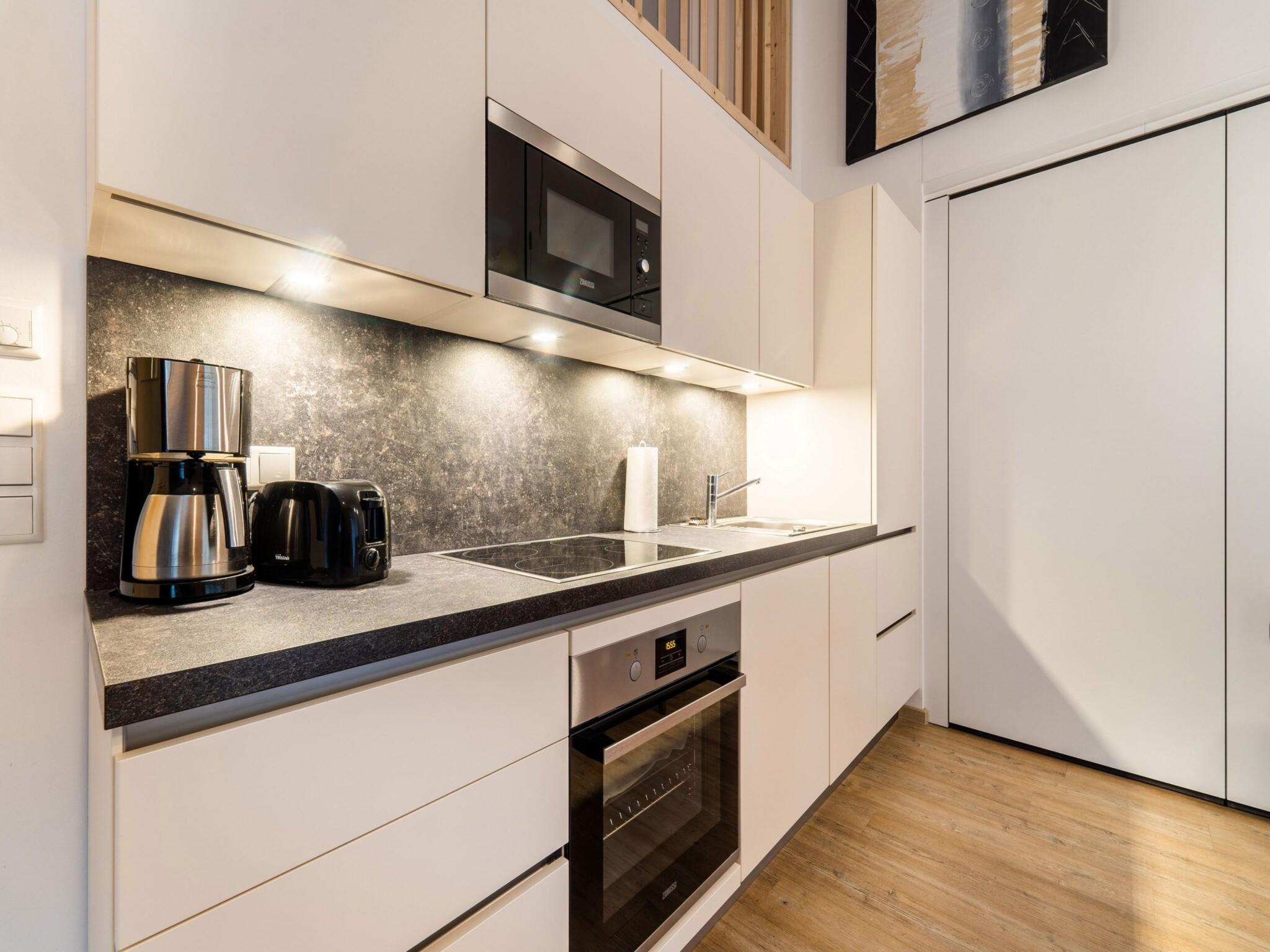 Modern kitchen at Al Shams in Bruck an der Großglocknerstraße