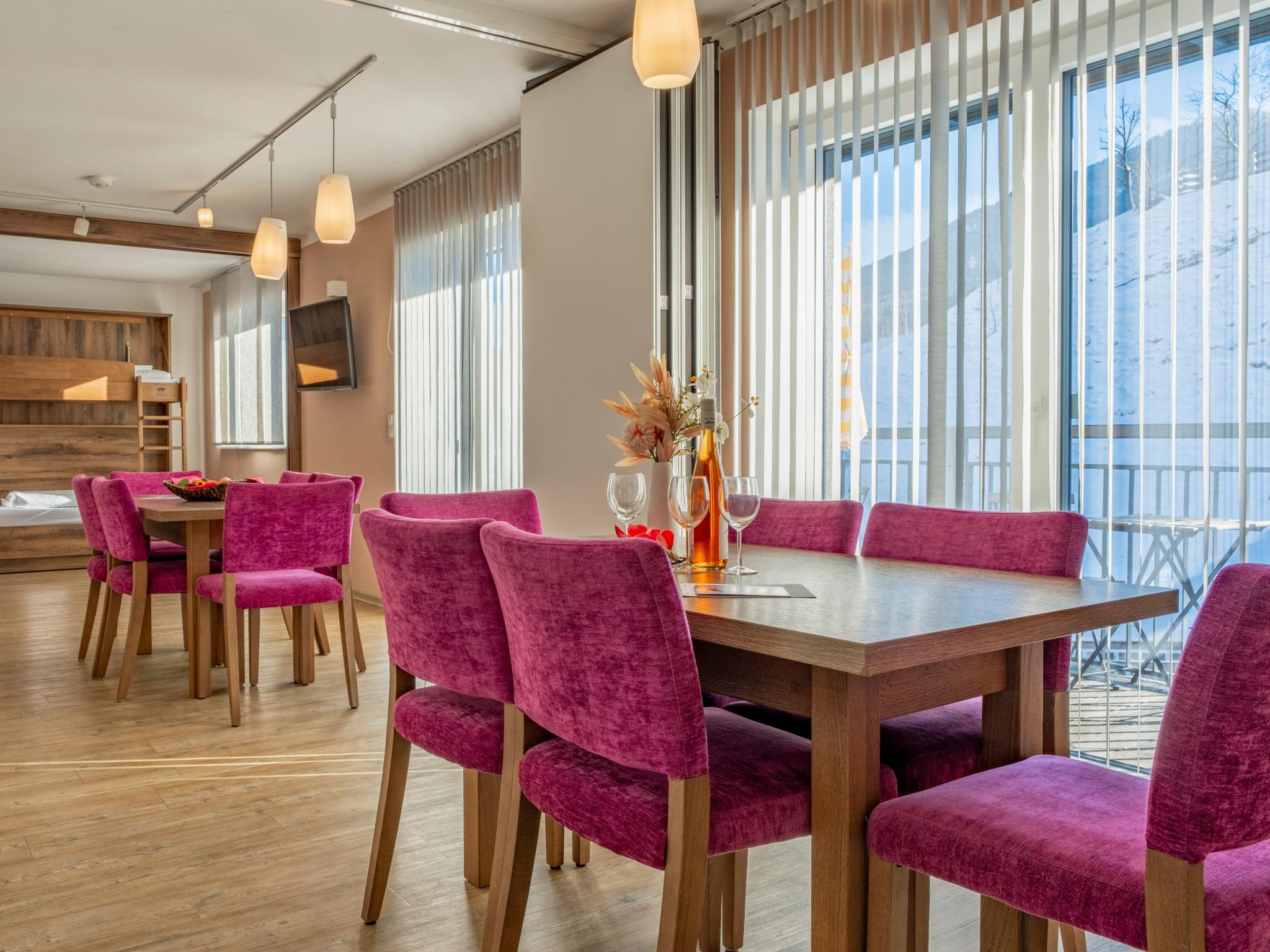 Bedroom with comfortable beds at Slunce in Bruck an der Großglocknerstraße