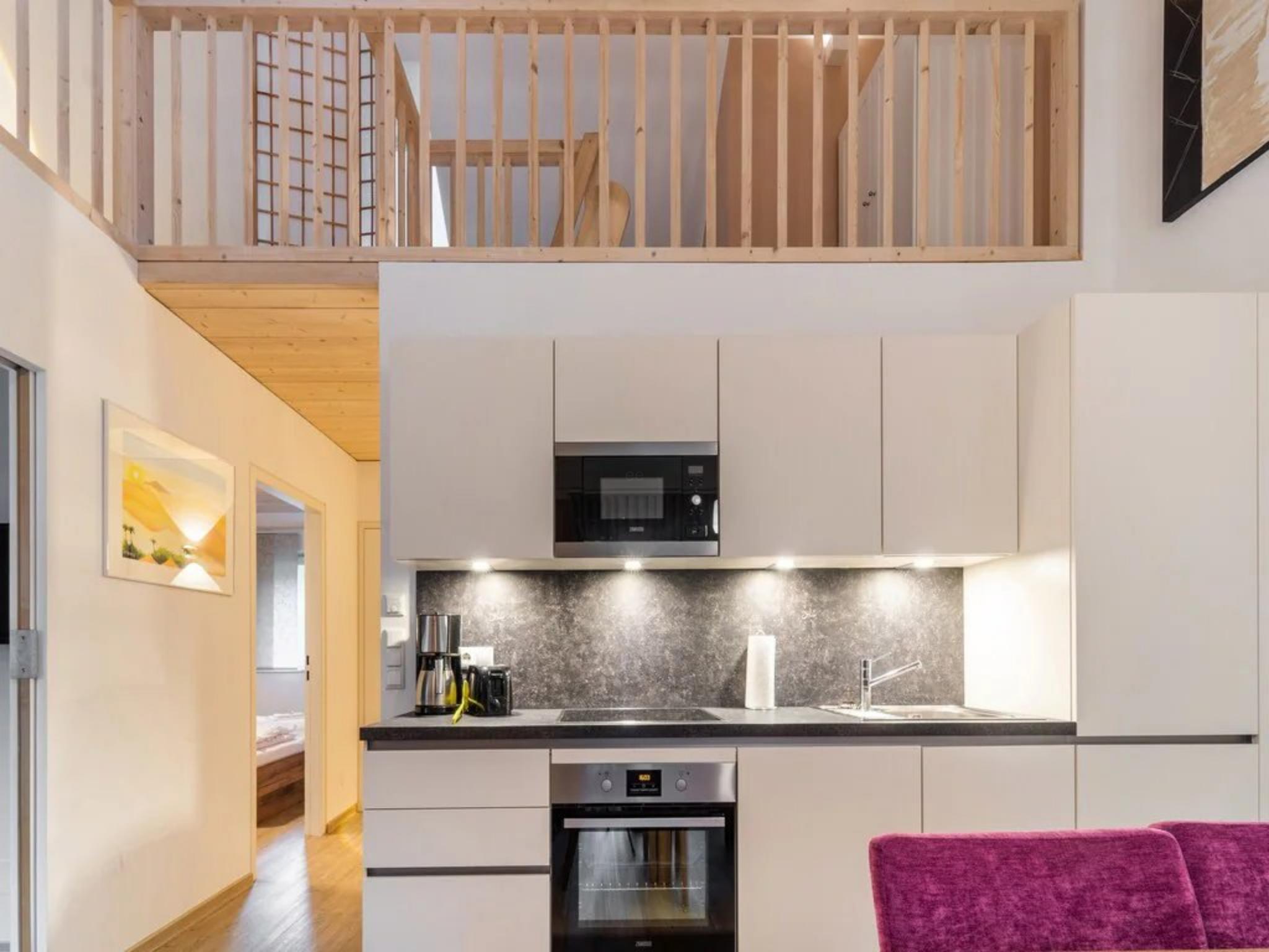 Bedroom with comfortable beds at Del Sol in Bruck an der Großglocknerstraße