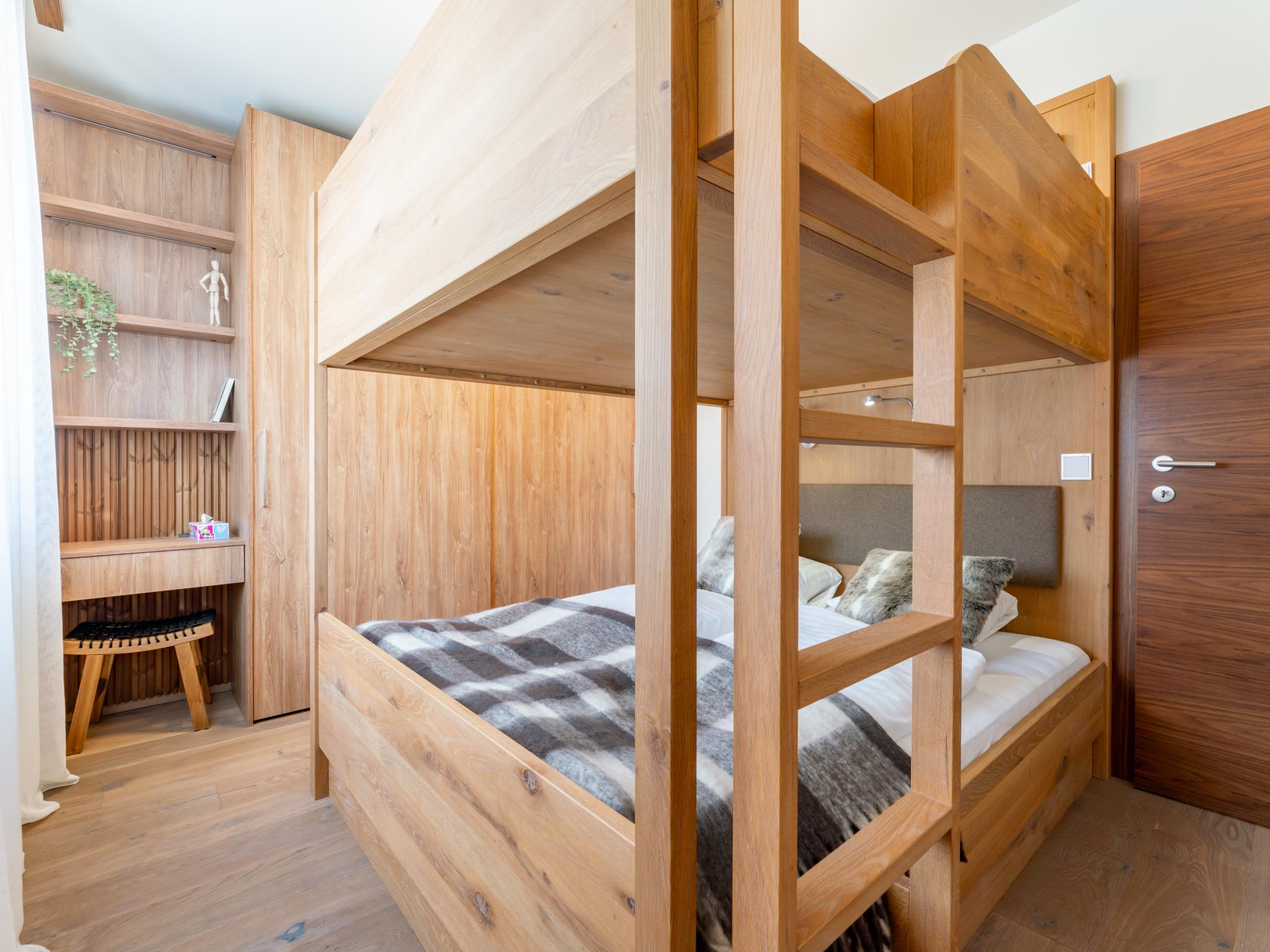 Bedroom with comfortable beds at Sonnenalpe Nassfeld Bergblume Top A01 in Sonnenalpe Nassfeld