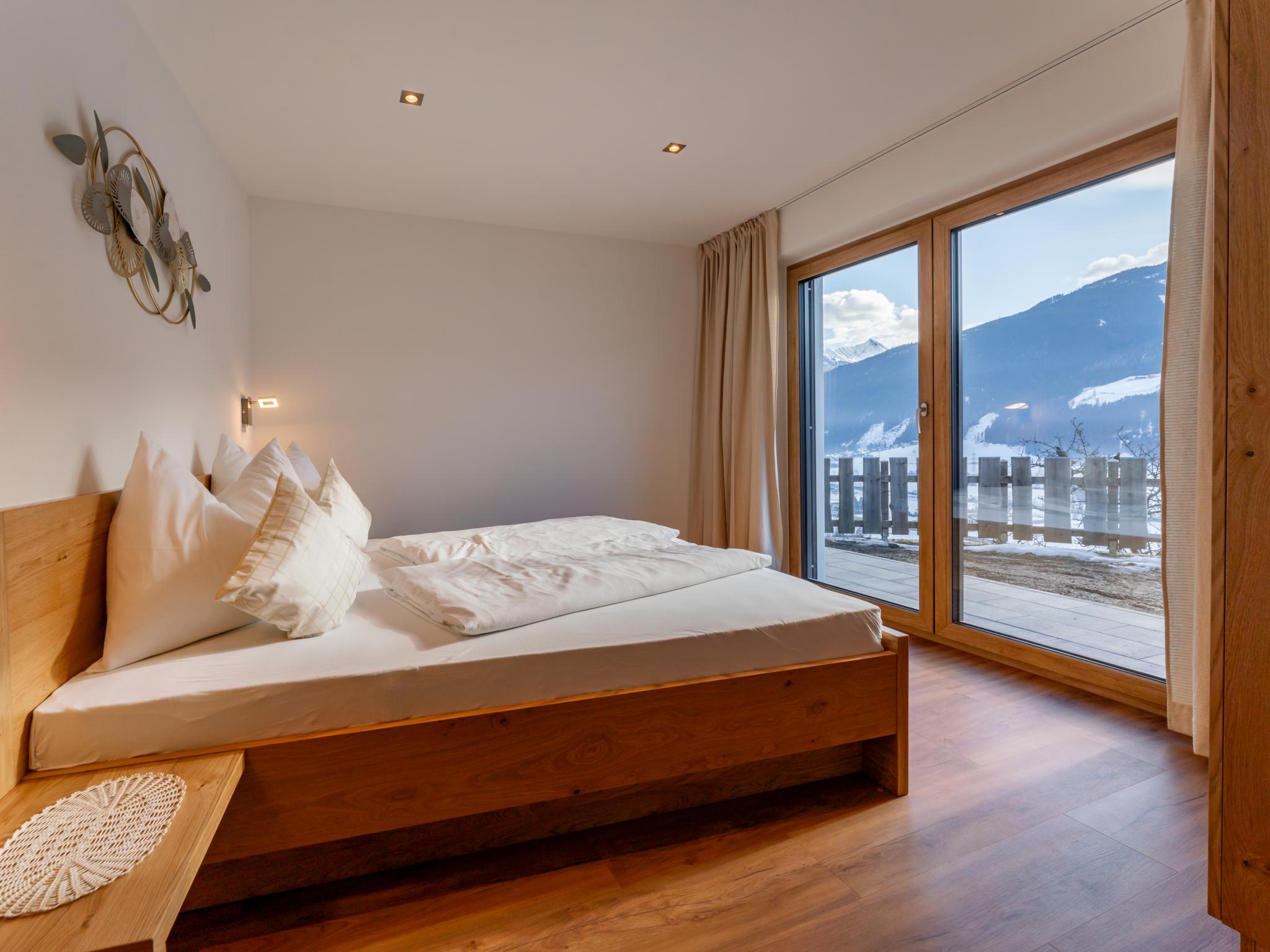 Bedroom with comfortable beds at Unterrainhof in Mittersill