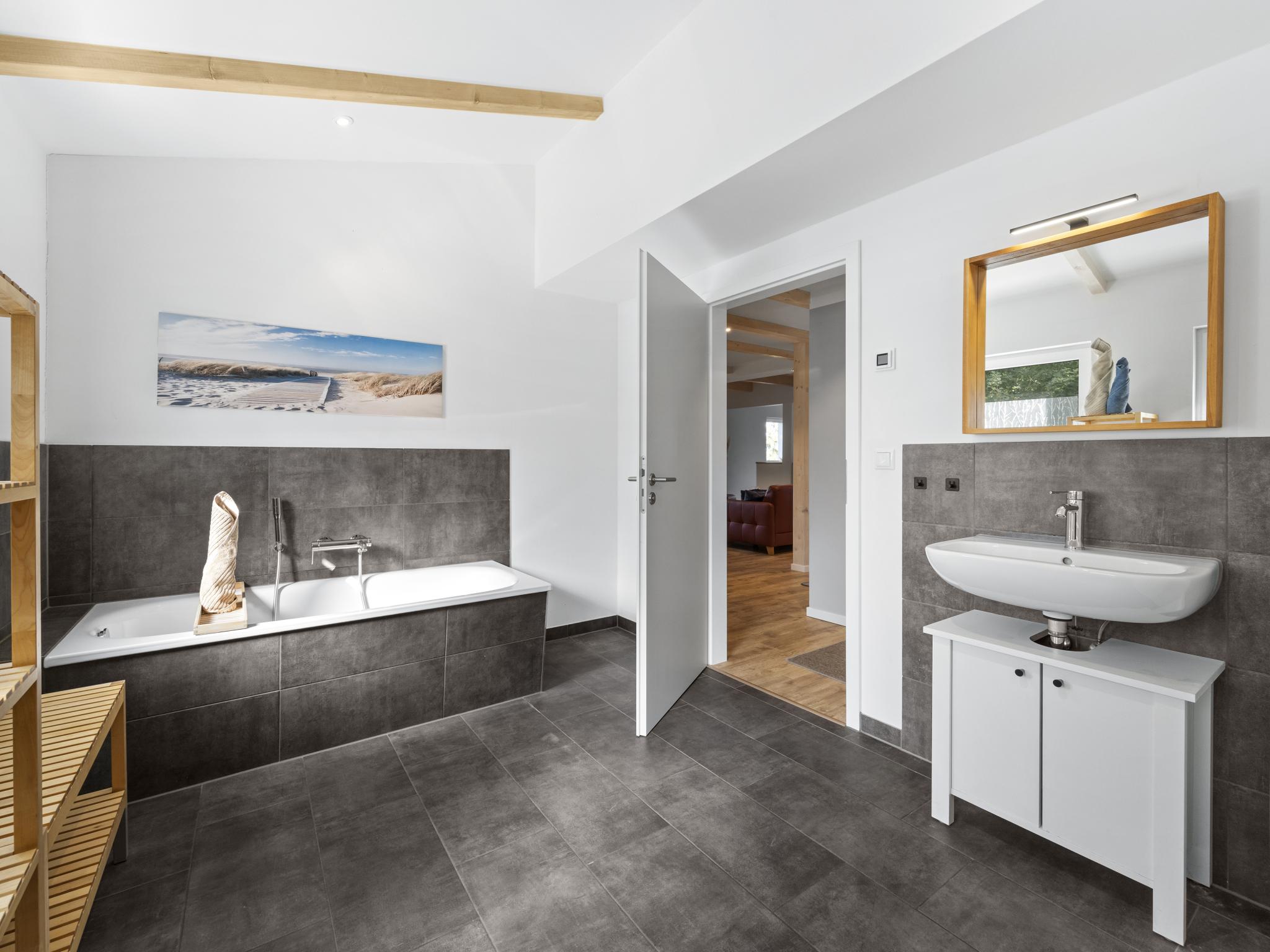 Bedroom with comfortable beds at Wilma - direkt an der Ostsee in Zierow