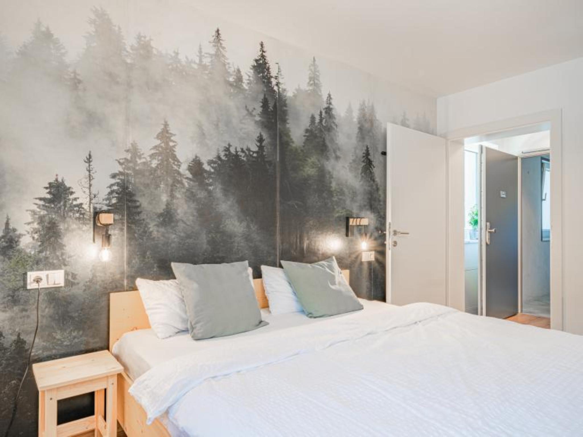 Bedroom with comfortable beds at Bei Resi und Lisi in Hopfgarten im Brixental