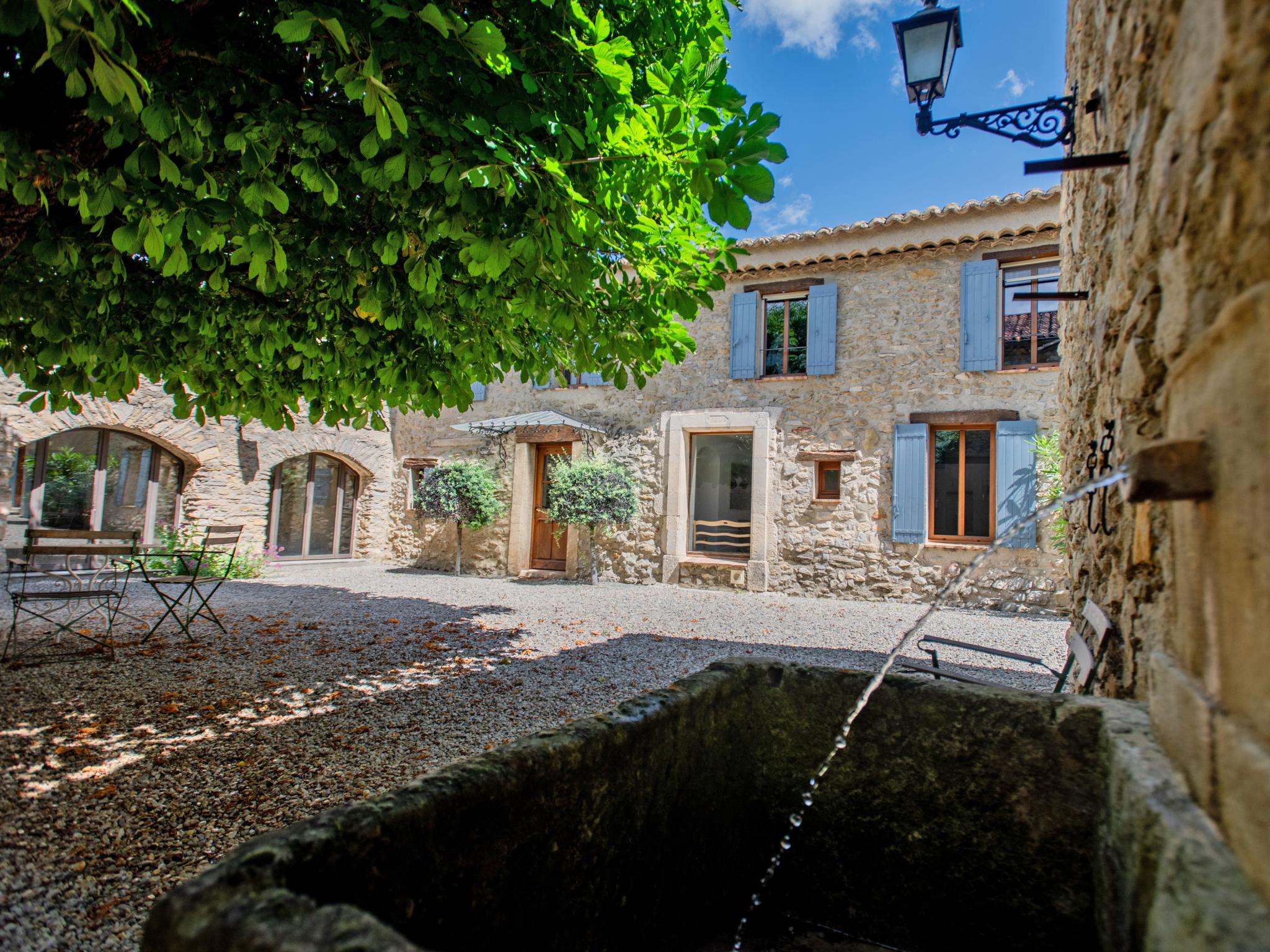 Bedroom with comfortable beds at Bastide St John in Séguret