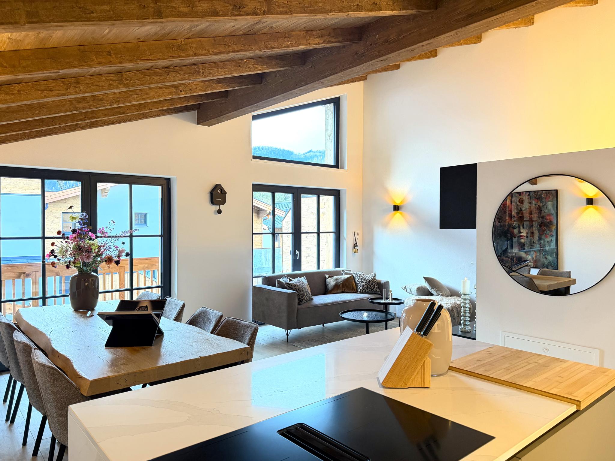 Bedroom with comfortable beds at Chalet Heidn Alm in Eben im Pongau