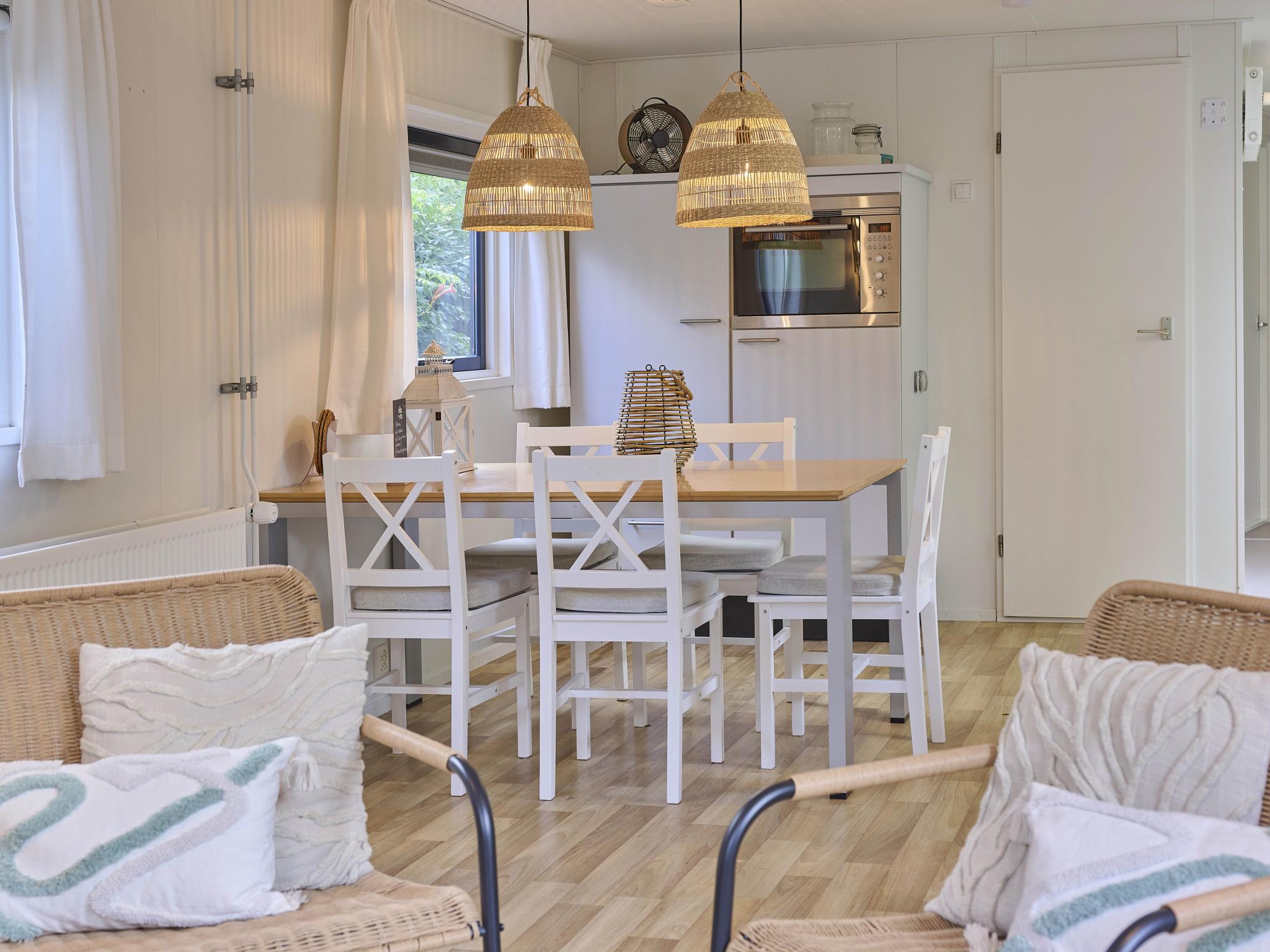 Outdoor terrace and views at Roodborst 91 in Goedereede