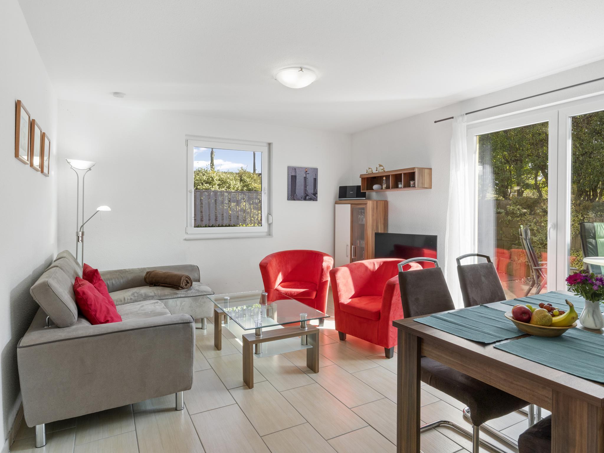 Living area at Windflüchter links mit Sauna in Boiensdorf