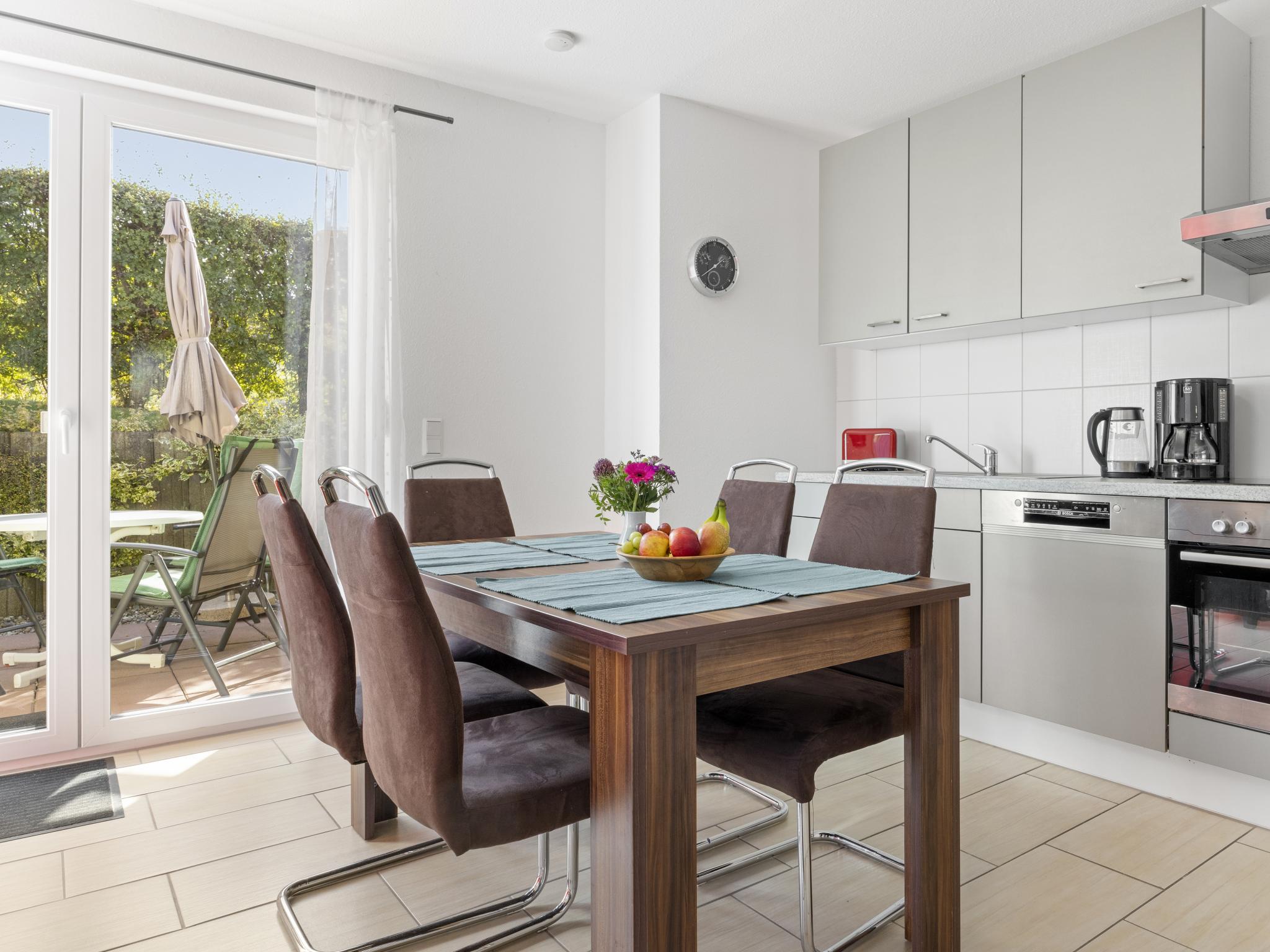 Modern kitchen at Windflüchter links mit Sauna in Boiensdorf