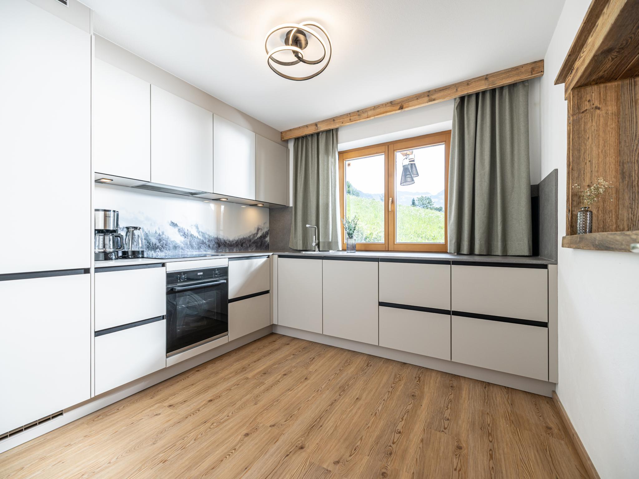 Bedroom with comfortable beds at Tirola Chalet Alpbach in Alpbach