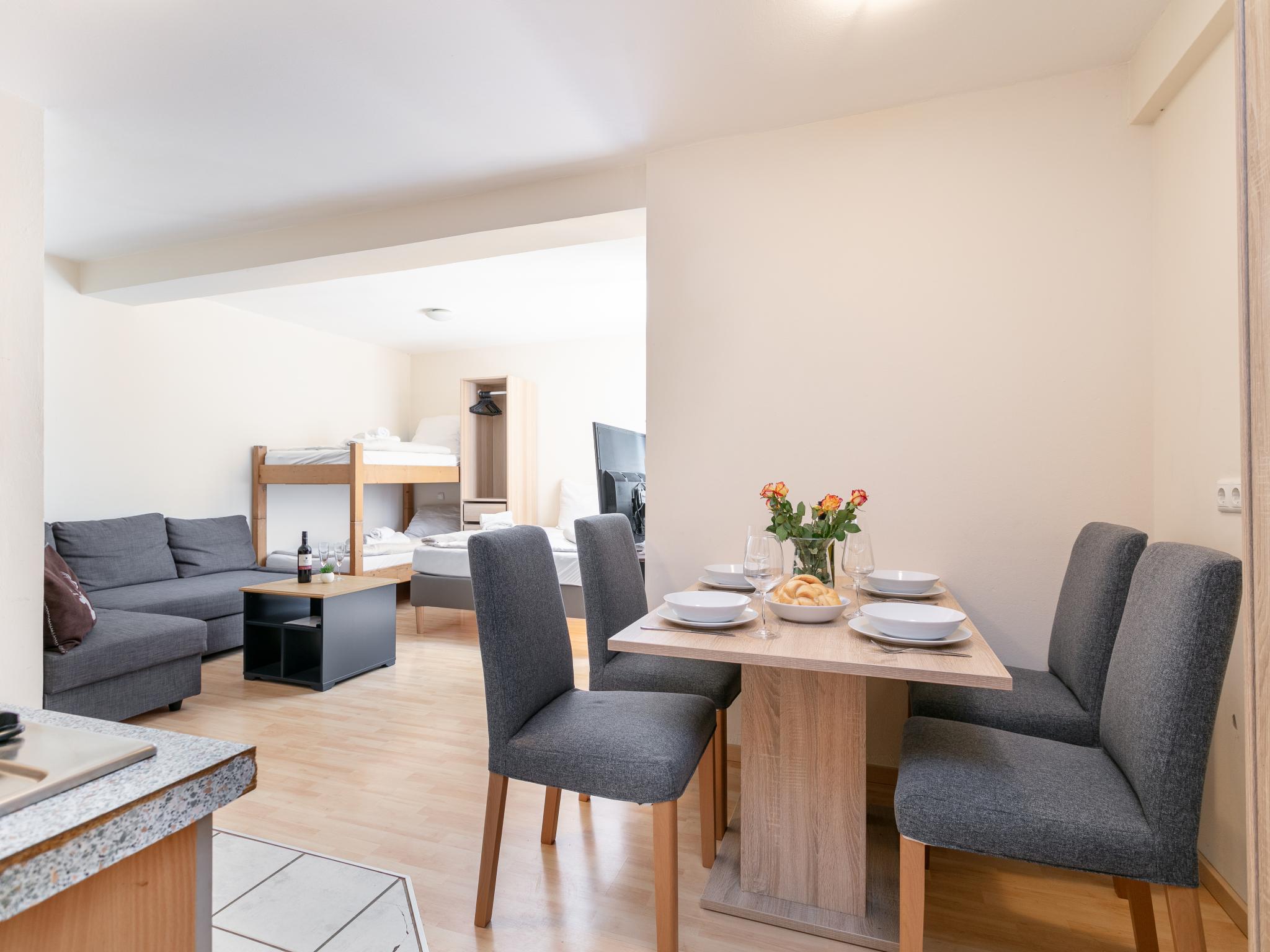 Bedroom with comfortable beds at Town House 1 und 2 in Hopfgarten im Brixental