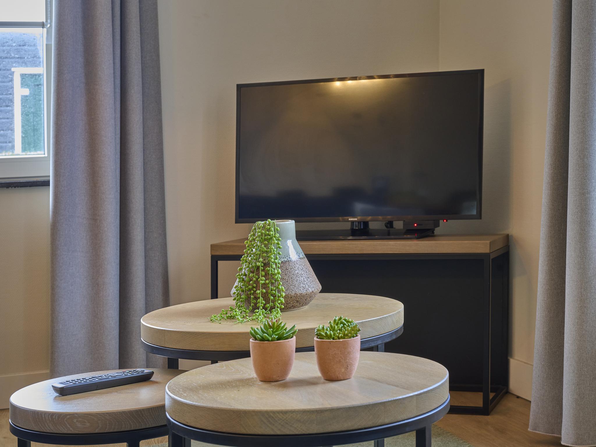 Outdoor terrace and views at Sauna Zee 27A in Colijnsplaat