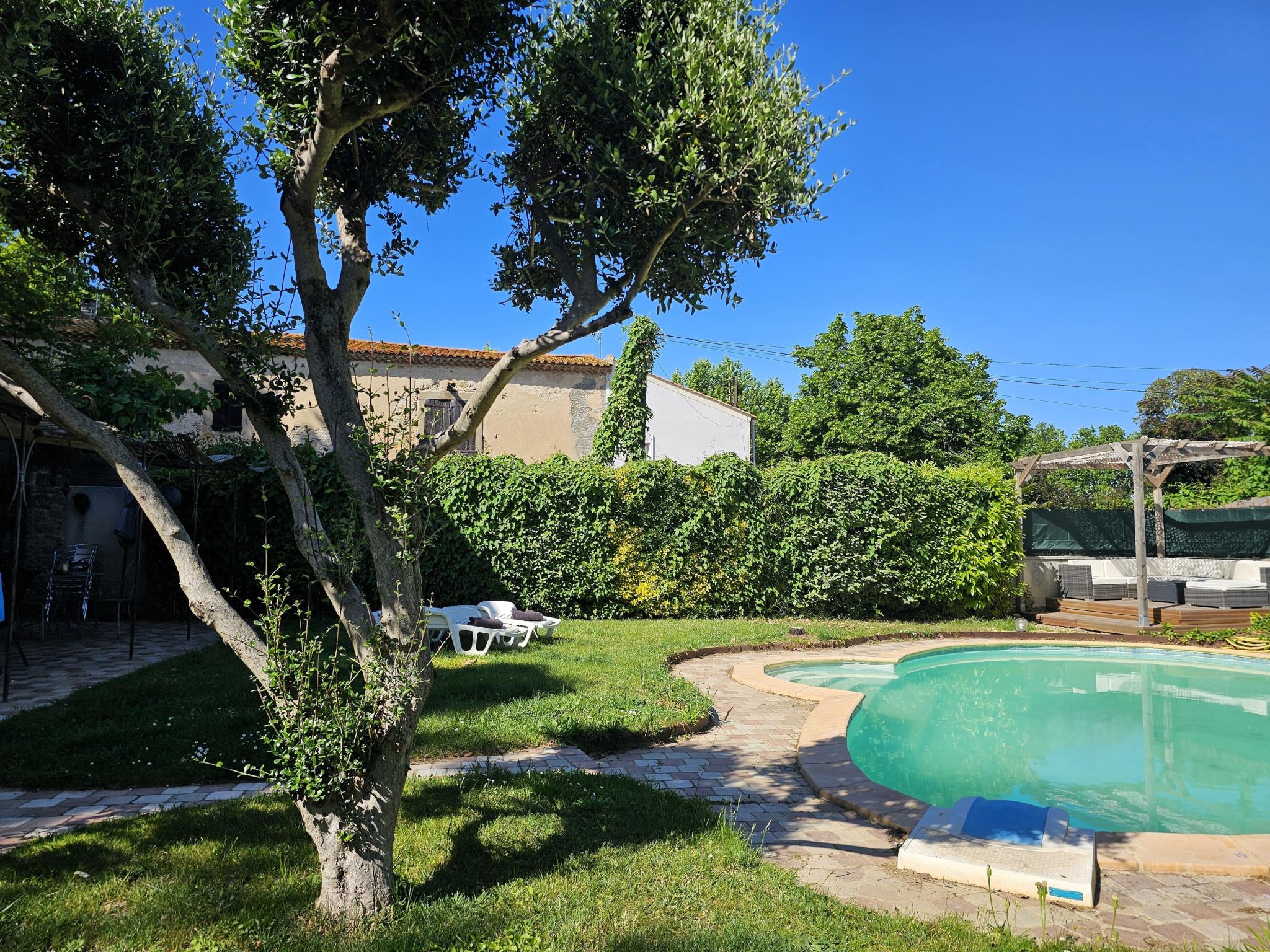 Bedroom with comfortable beds at Les Châtaignes in Canet