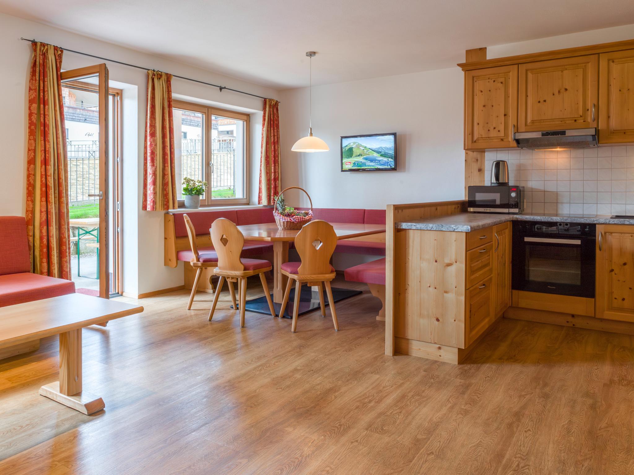Outdoor terrace and views at Next To The Skilift A 2 in Brixen im Thale
