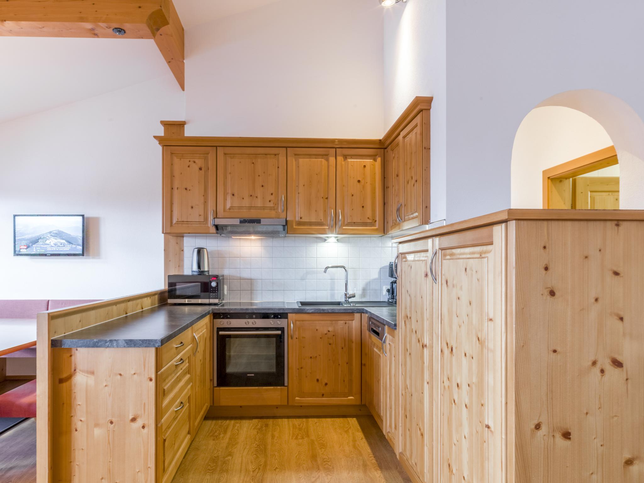 Swimming pool area at Next To The Skilift A 6 in Brixen im Thale