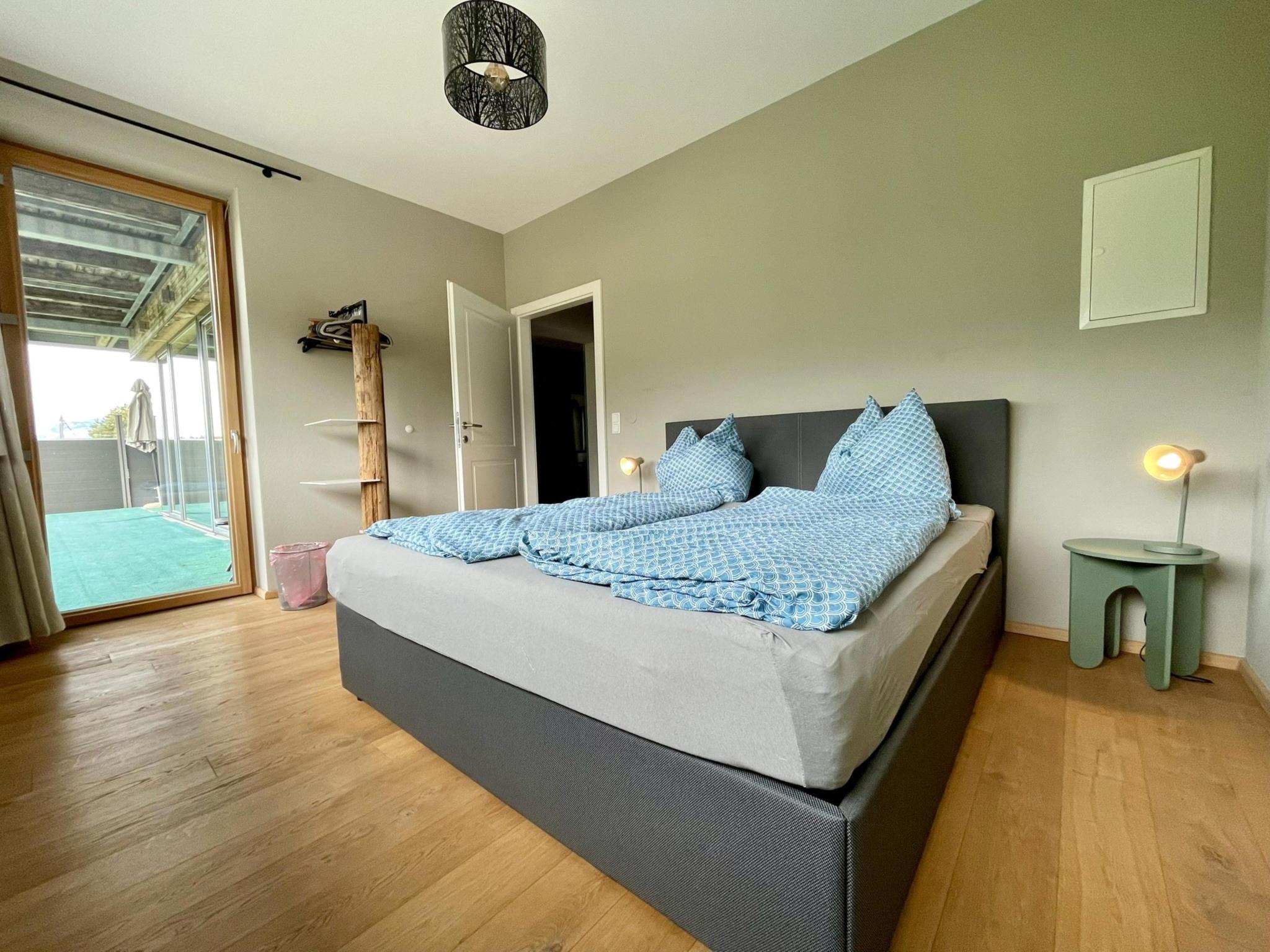Bedroom with comfortable beds at Residenz Aichwaldsee in Unteraichwald