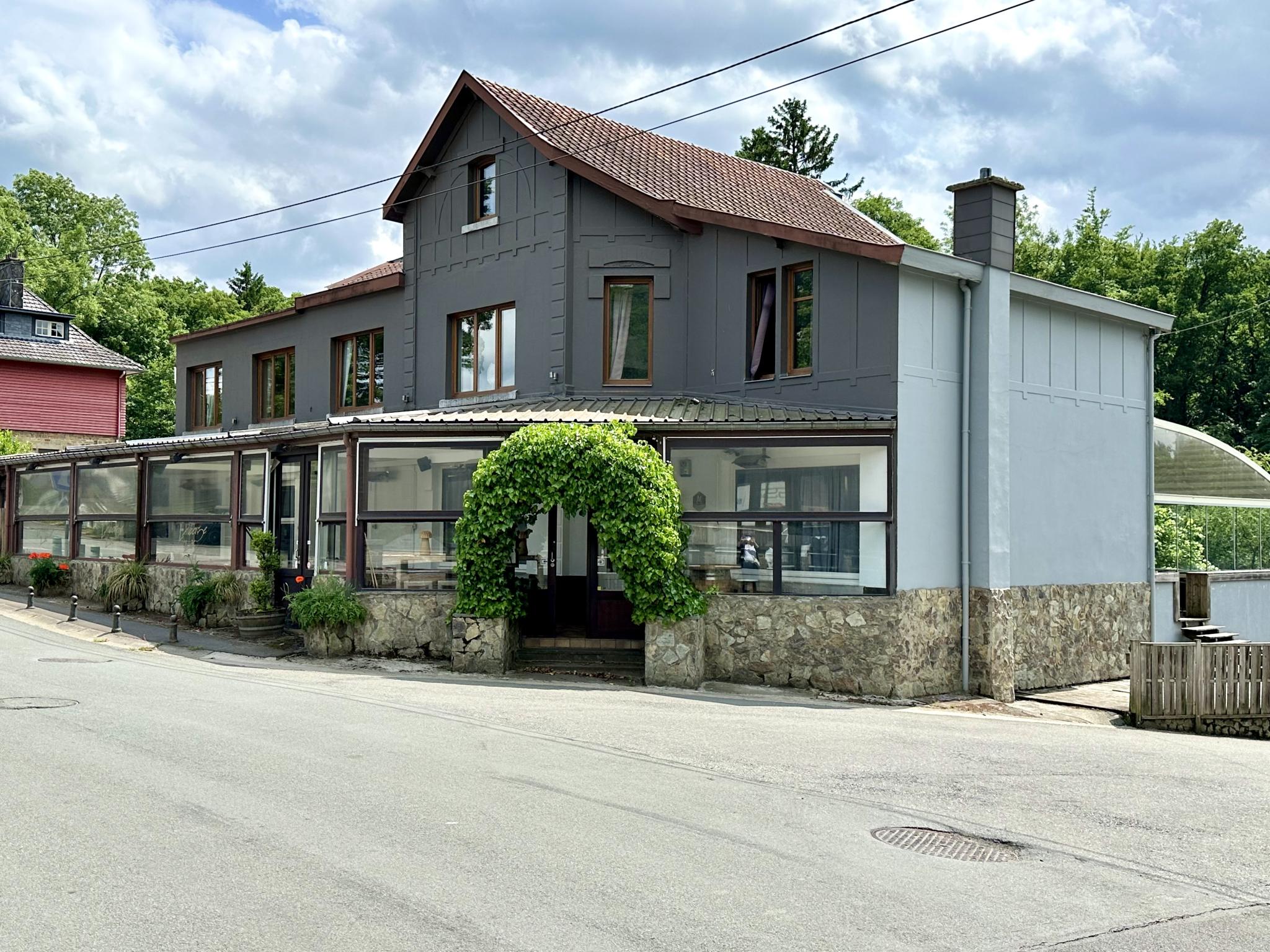 Outdoor terrace and views at Aux Berges du Lac in Jalhay