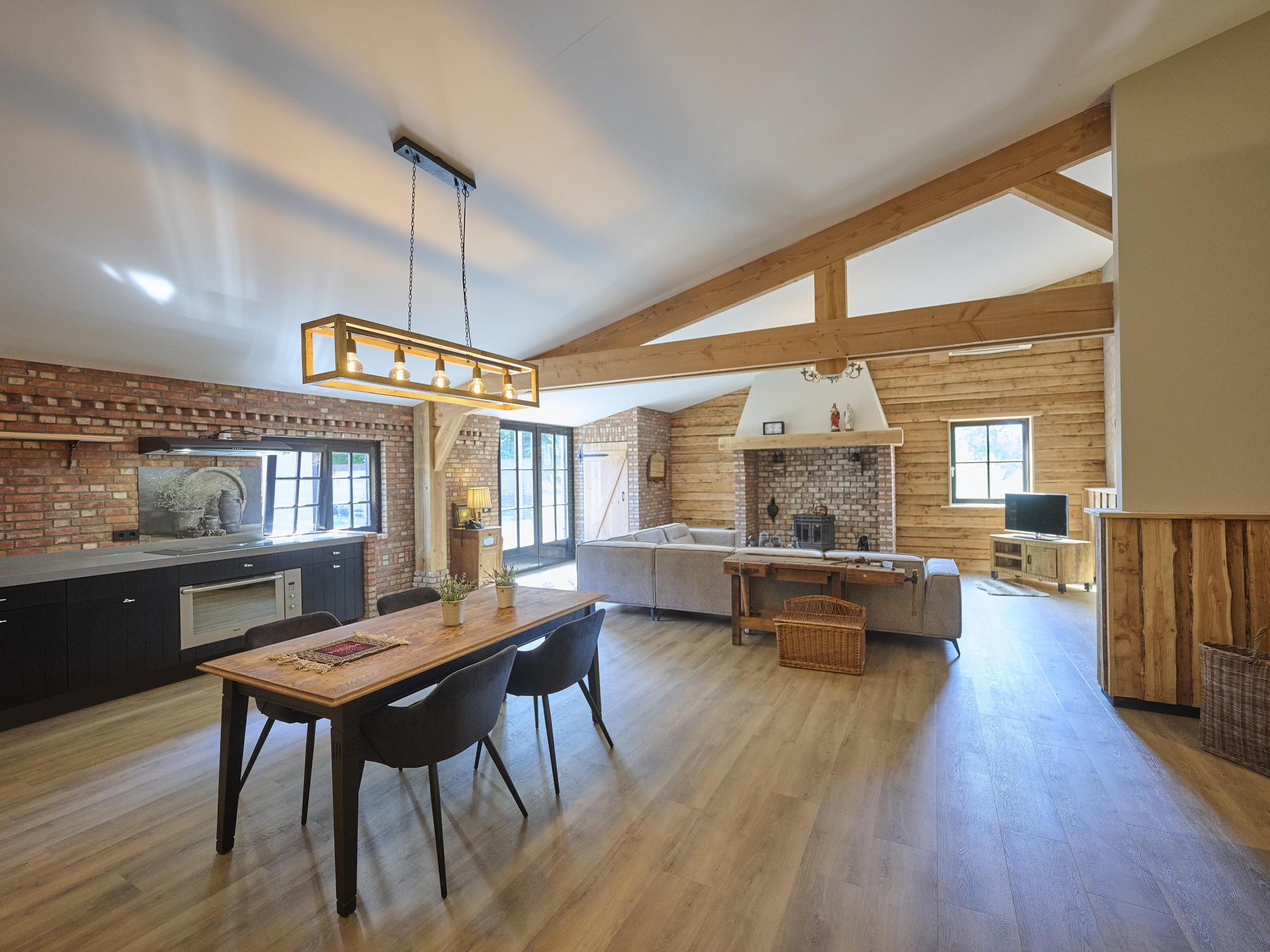 Bedroom with comfortable beds at De Hoeve III in Hulsel