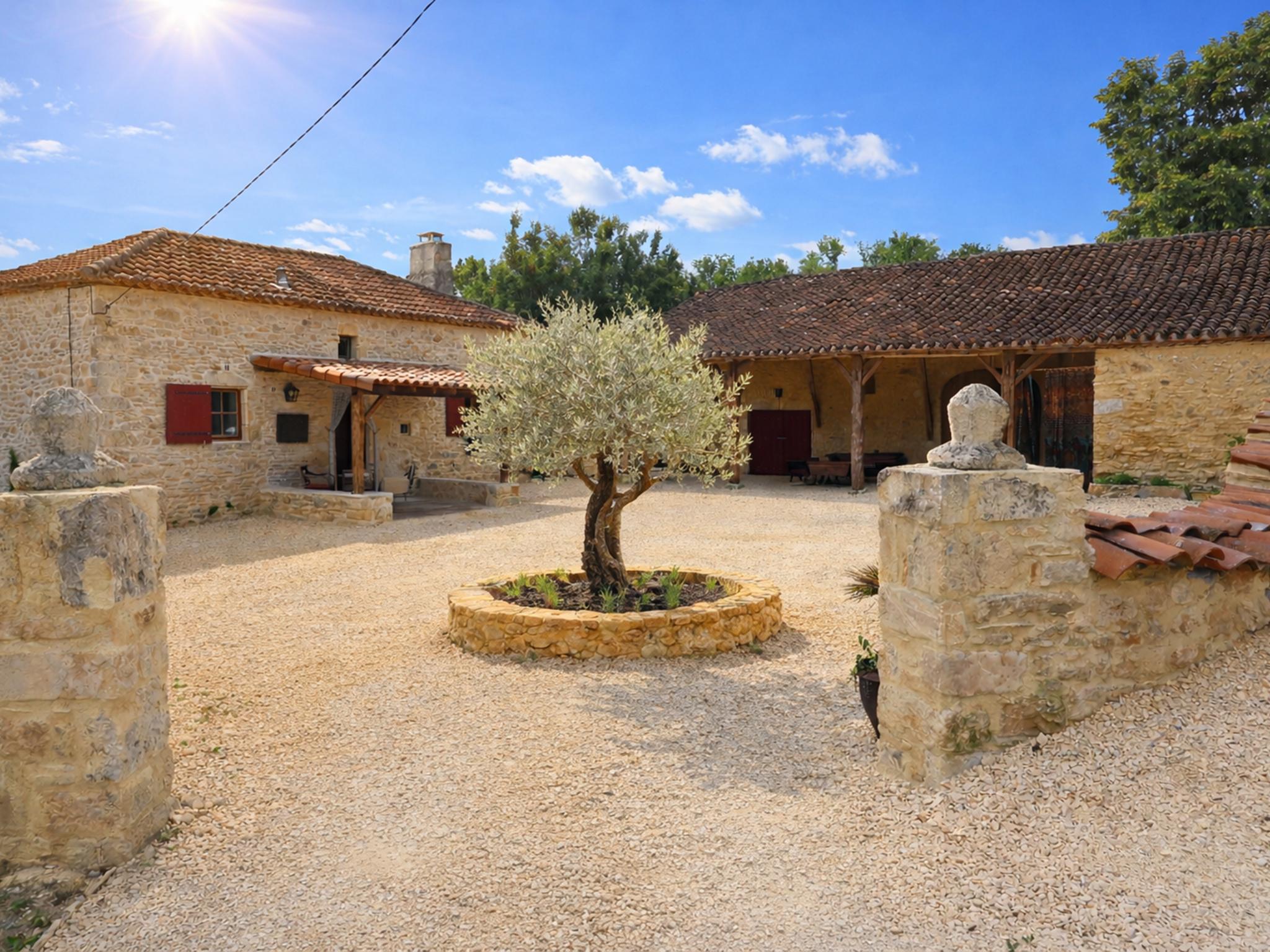 Bedroom with comfortable beds at Le Mas dAmour in Montcabrier