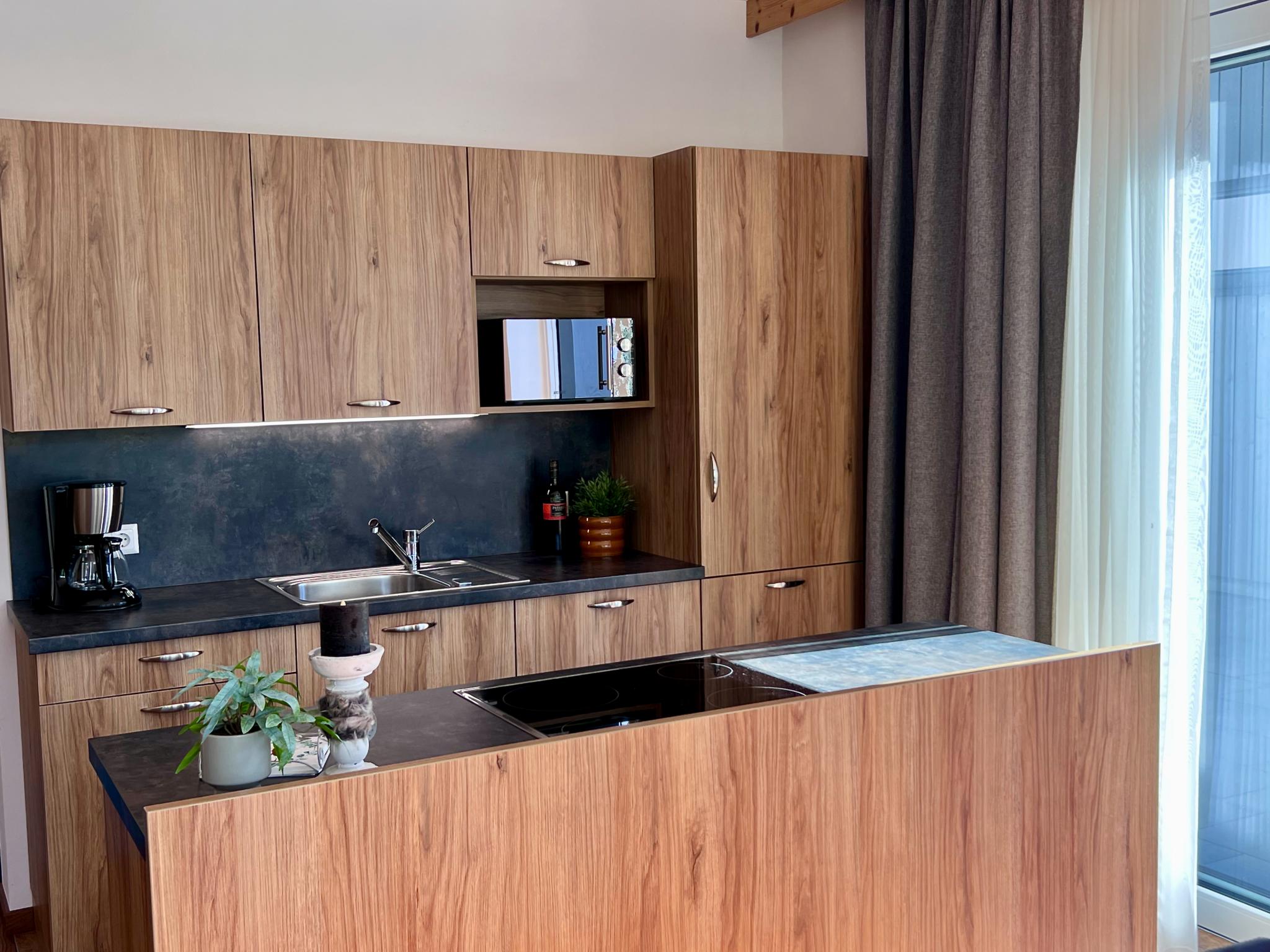 Bedroom with comfortable beds at Winzerchalet in Sankt Lambrecht