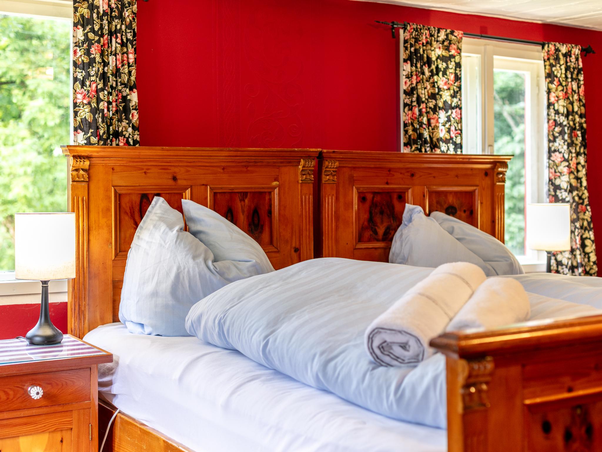 Bedroom with comfortable beds at Waldhüsle in Dalaas