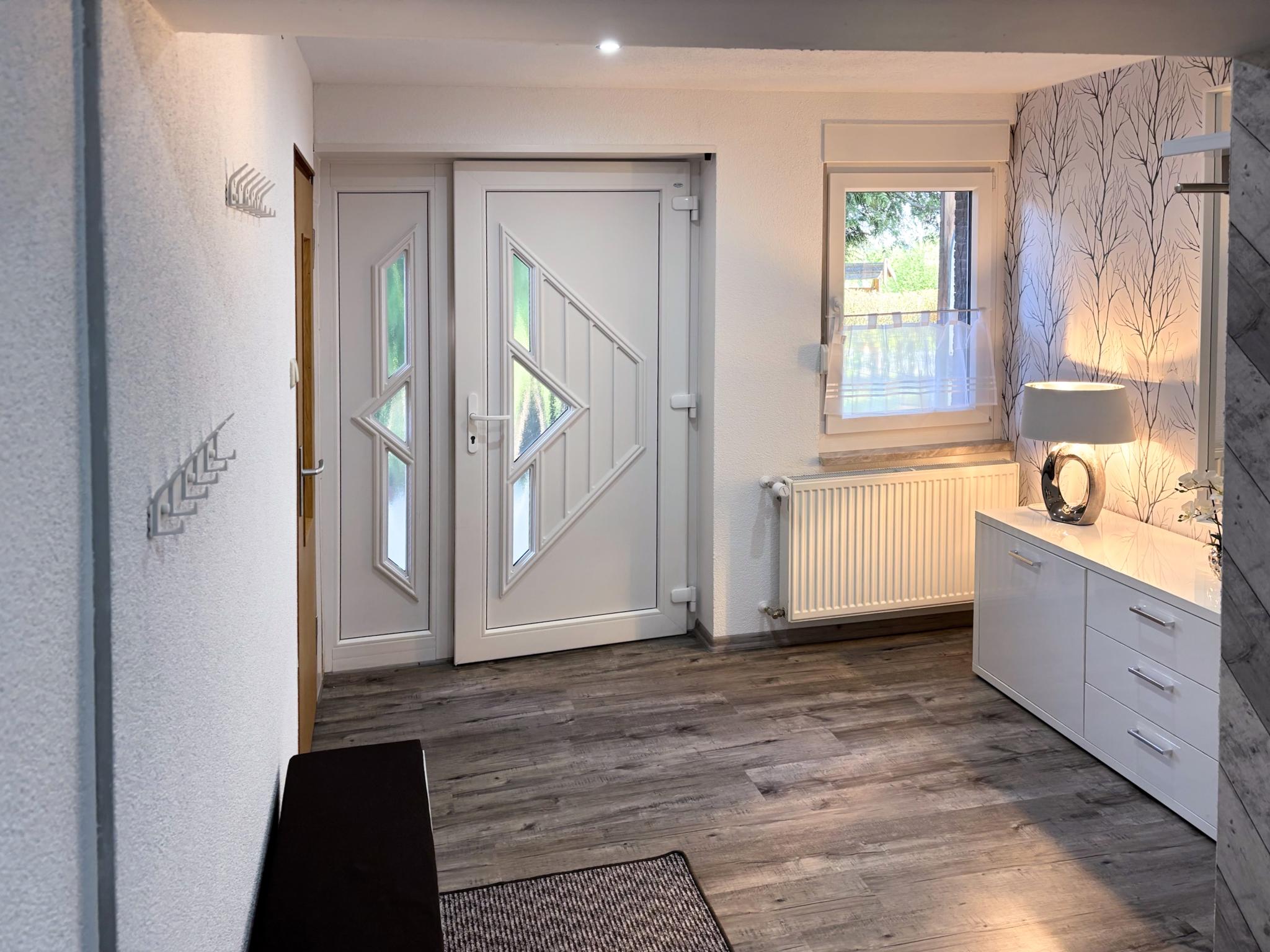 Bedroom with comfortable beds at Zur Teufelsmauer in Blankenburg OT Helsungen