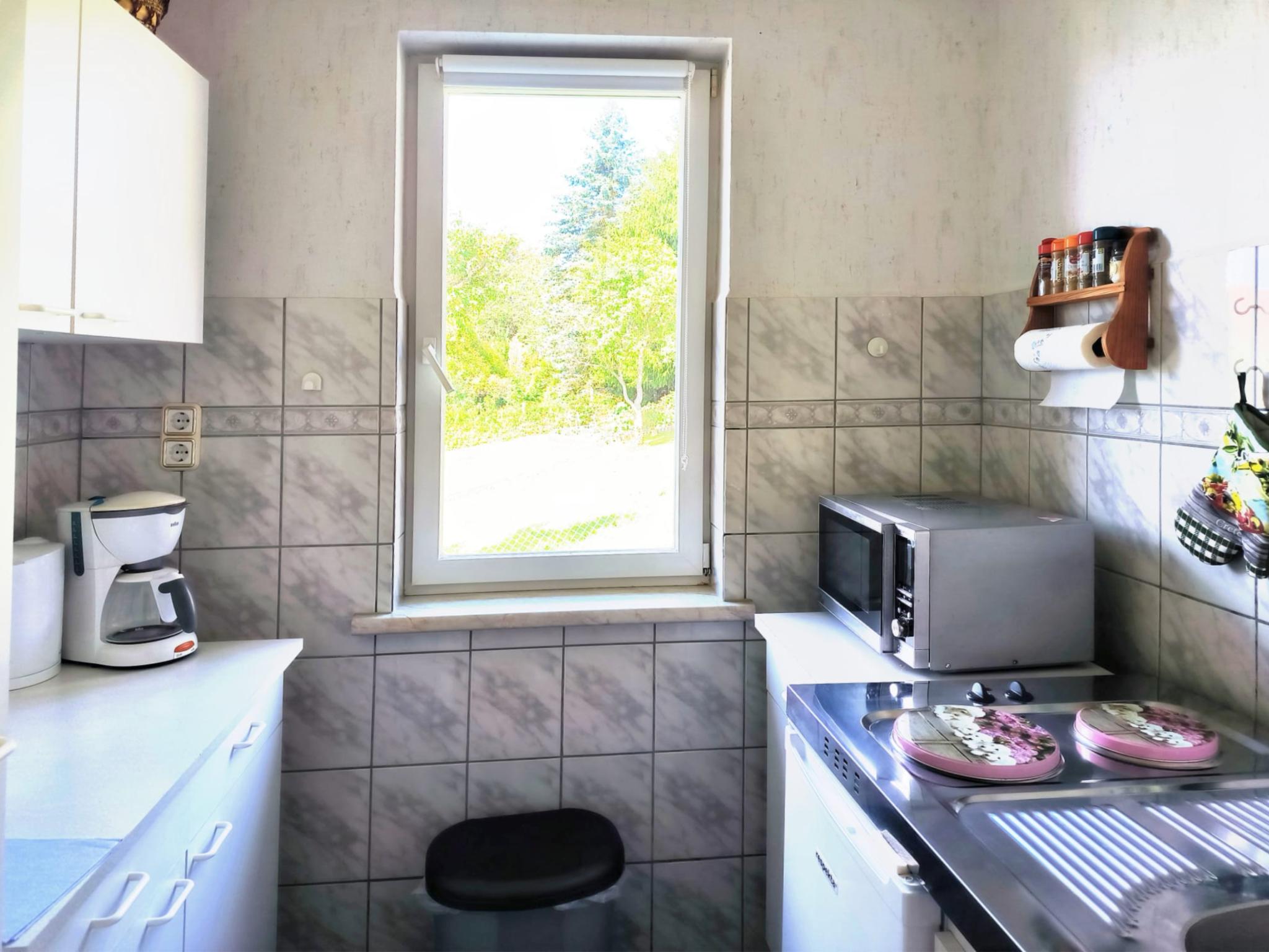 Outdoor terrace and views at Am Springelbach in Schleusingen OT Hinternah