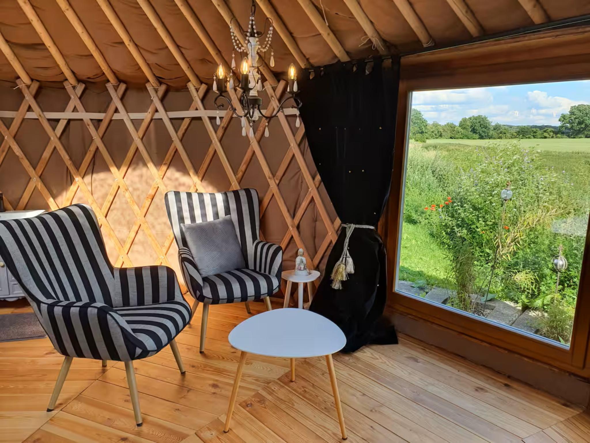 Bedroom with comfortable beds at Glamour-Camping in Detershagen