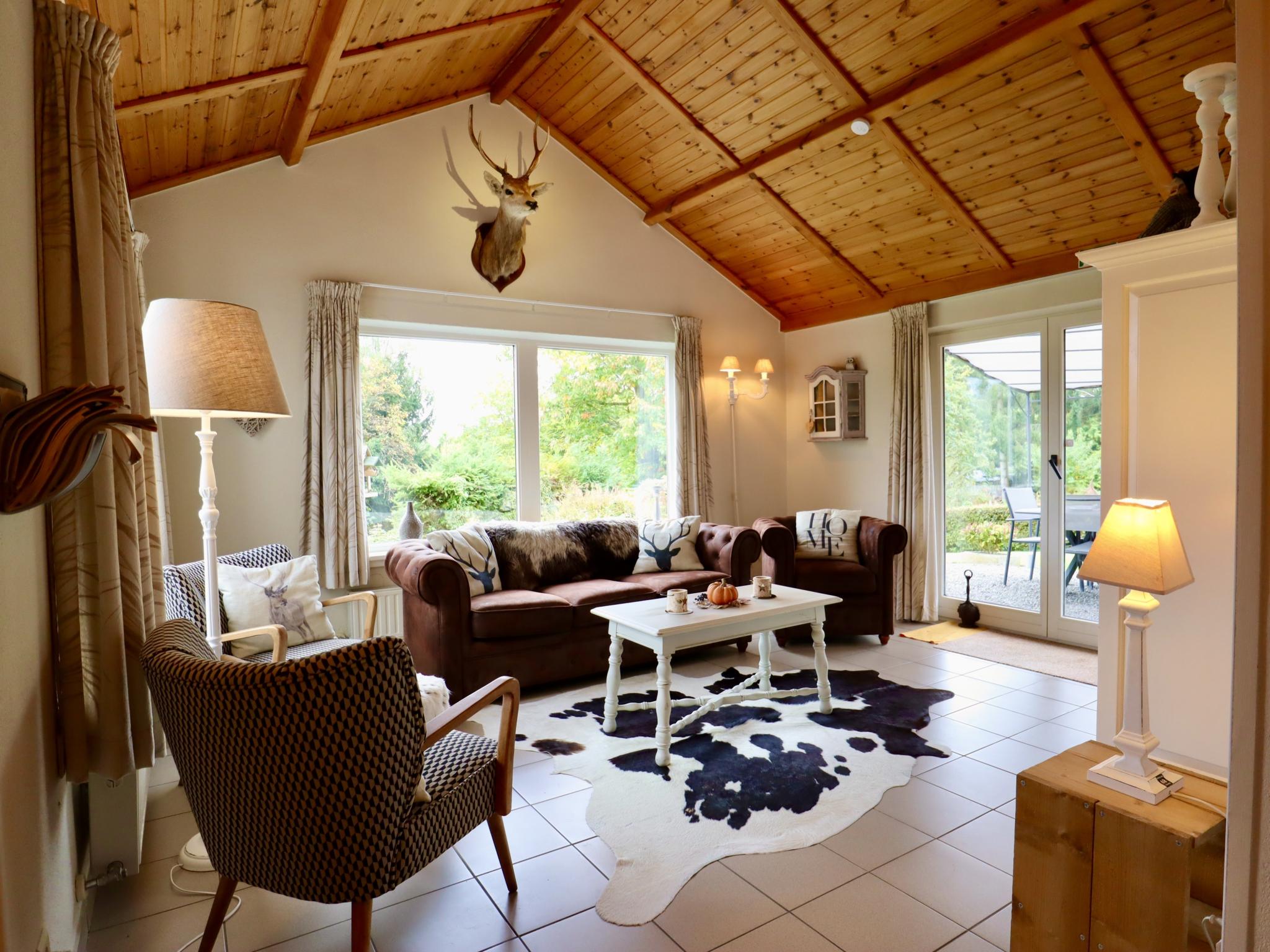 Bedroom with comfortable beds at Coeur de Biche in Rendeux