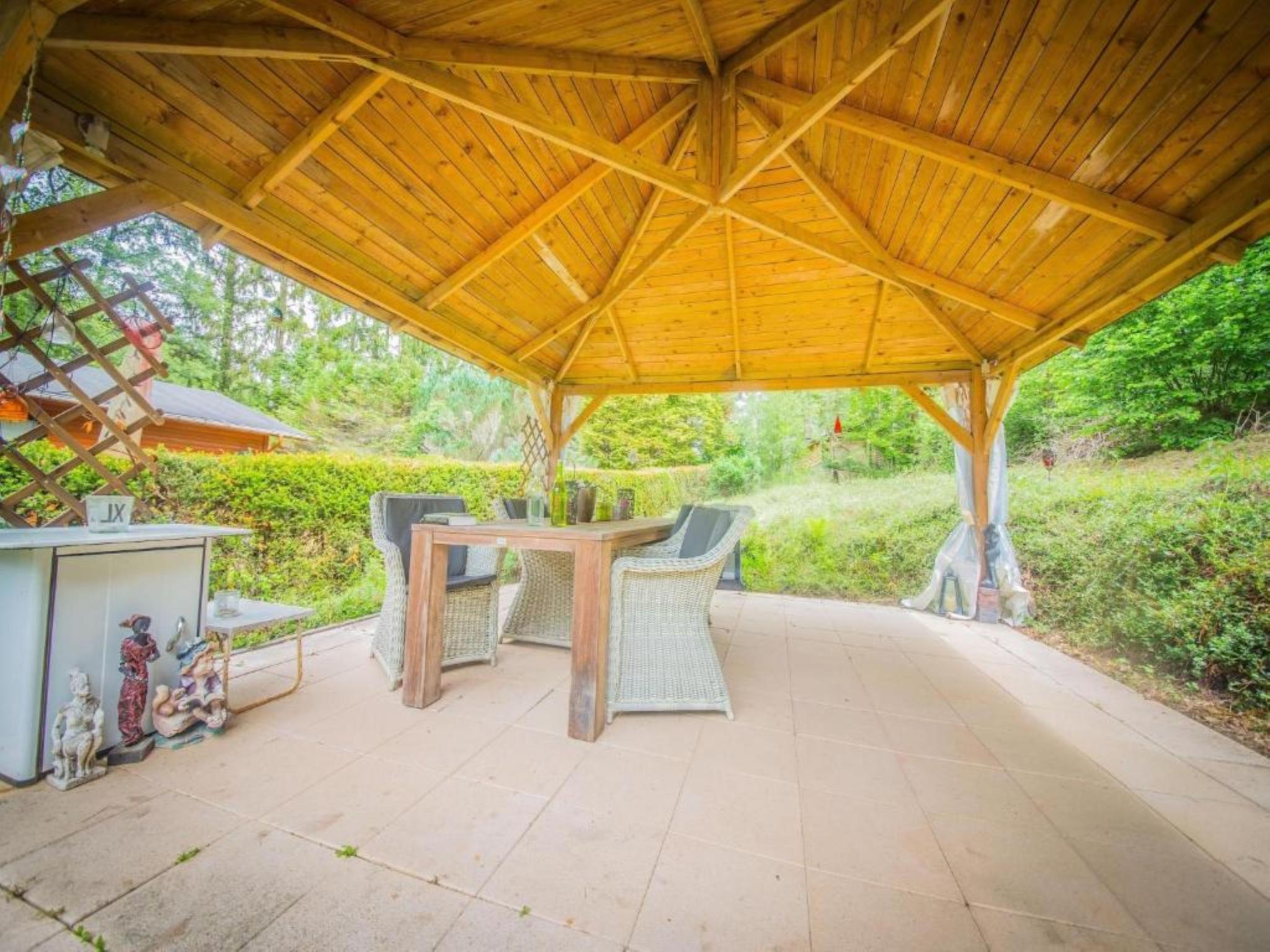 Outdoor terrace and views at ChaLaise in Rendeux
