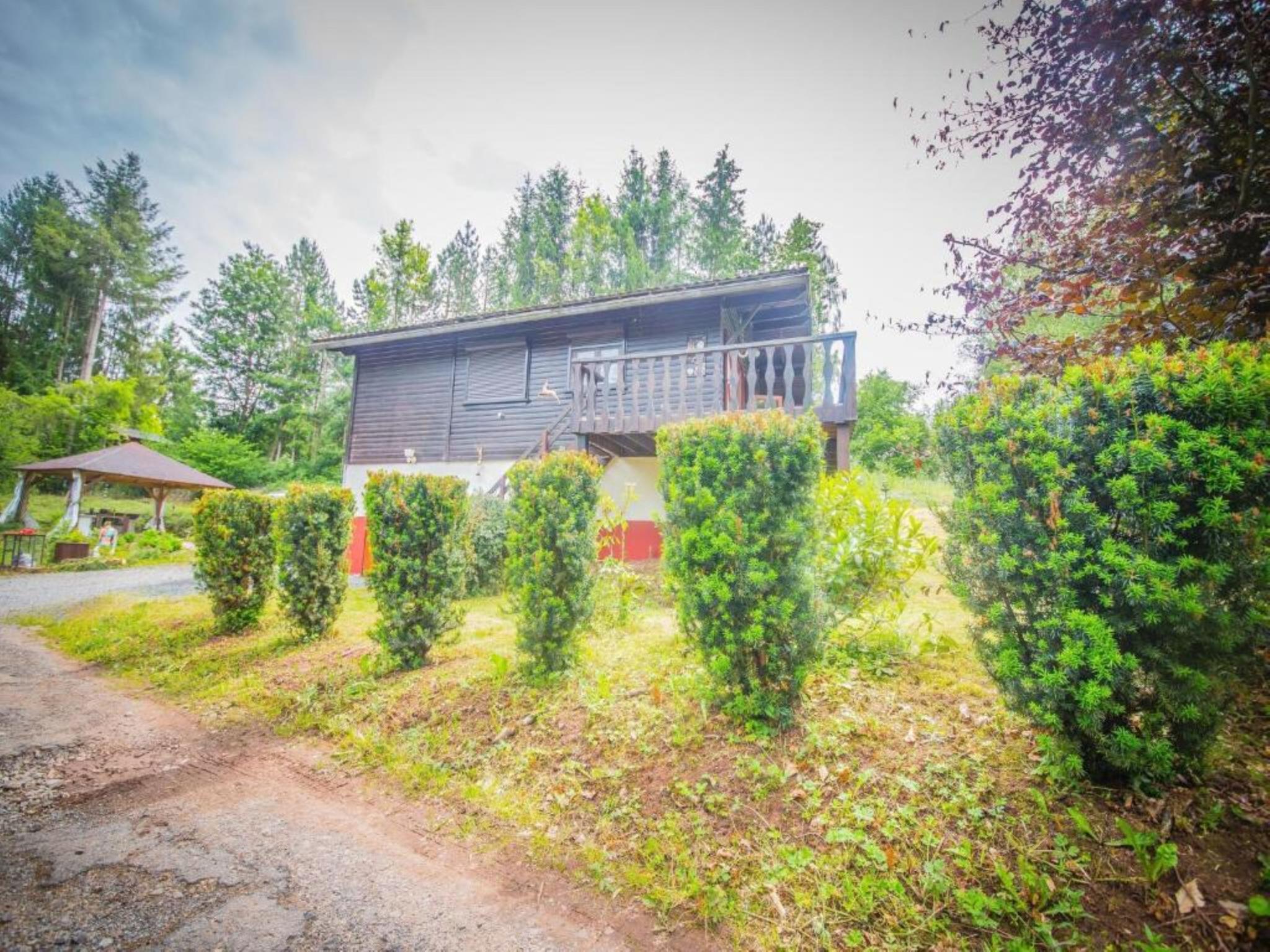 Bedroom with comfortable beds at ChaLaise in Rendeux