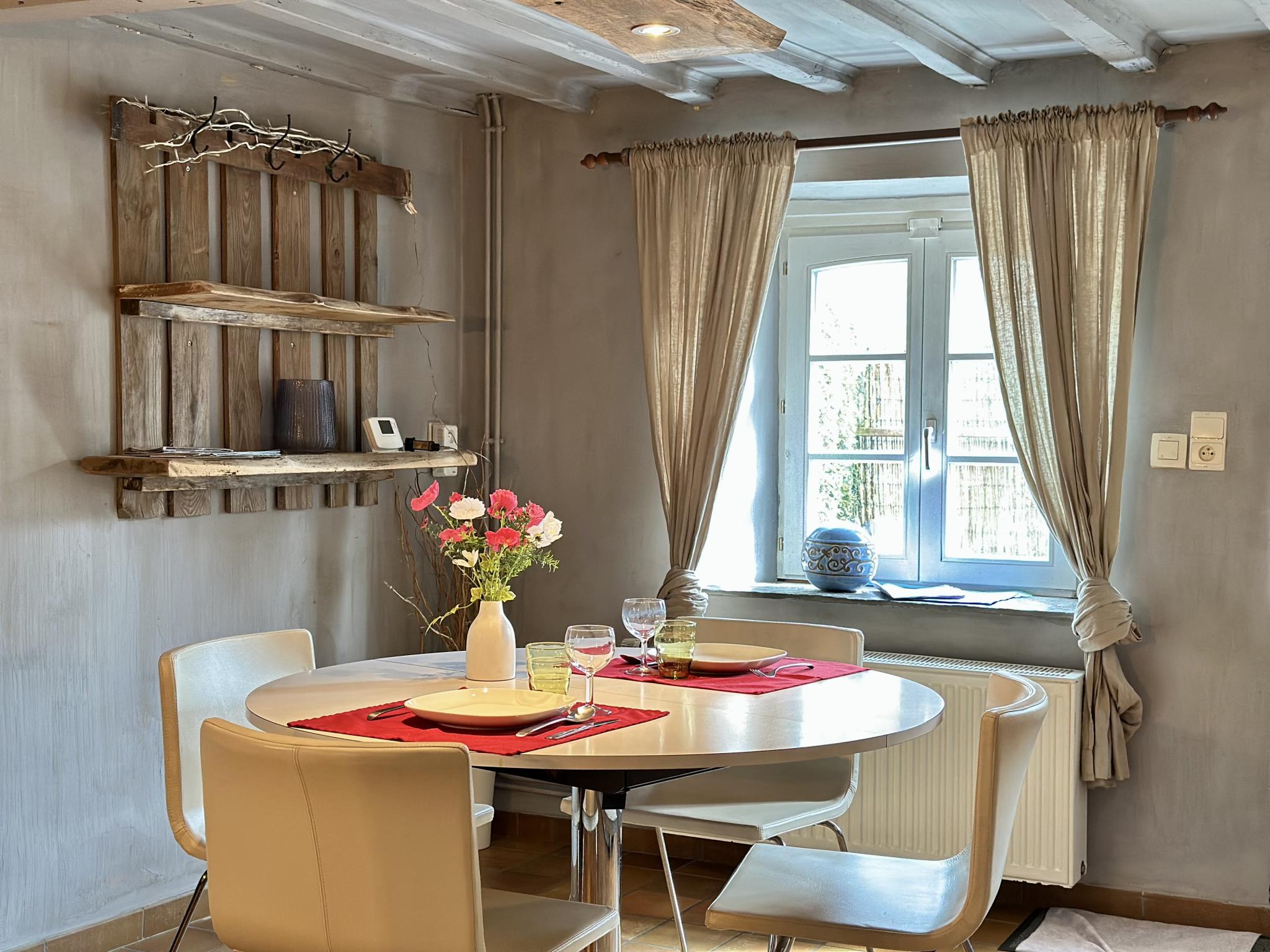 Bedroom with comfortable beds at Le Fournil in Manhay