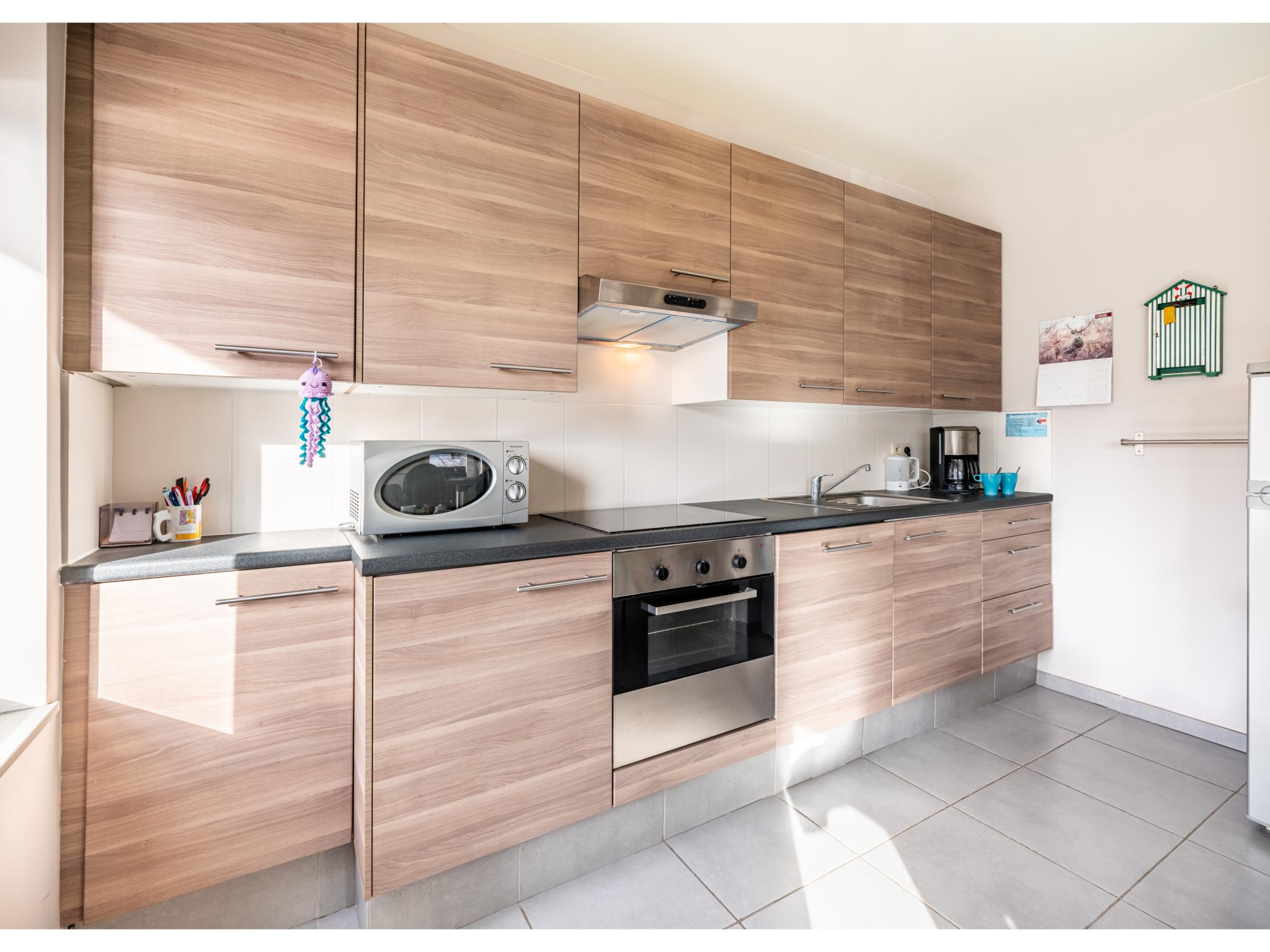 Modern kitchen at Les Trois Moineaux in Koksijde