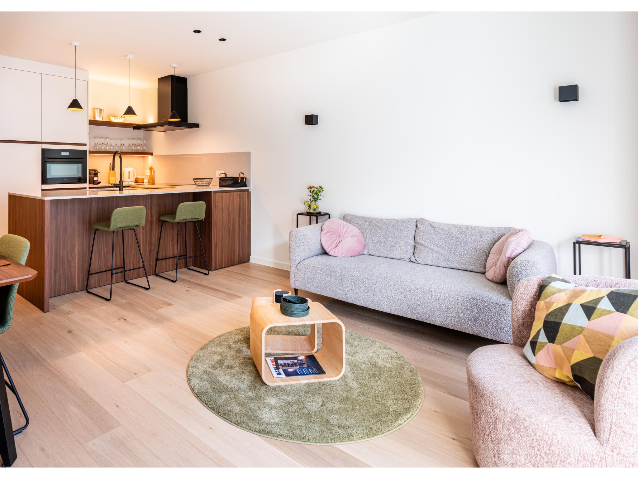 Bedroom with comfortable beds at La Balise Derde in Koksijde