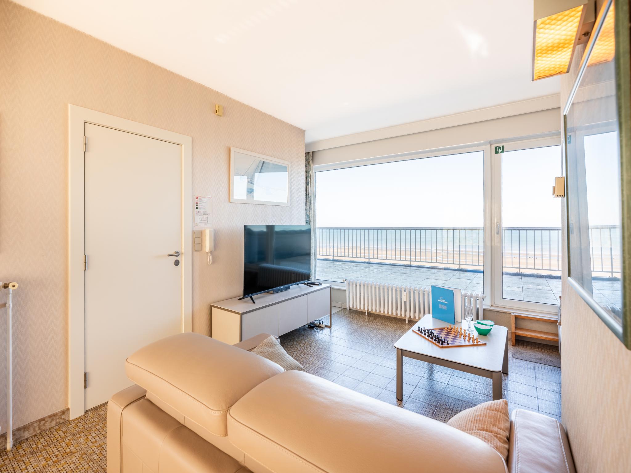 Bedroom with comfortable beds at Zeezicht 7e in Koksijde