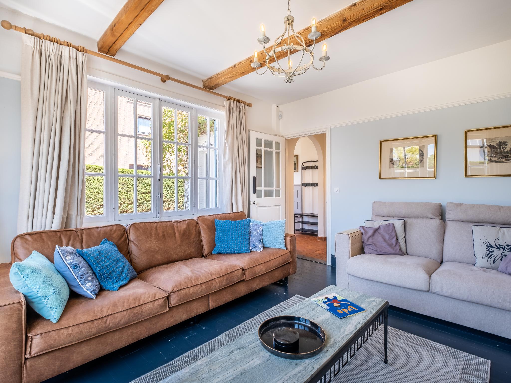 Living area at Le Charme in Koksijde