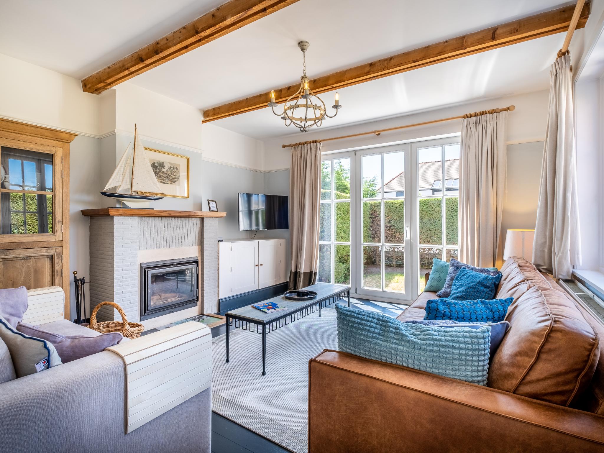 Bedroom with comfortable beds at Le Charme in Koksijde