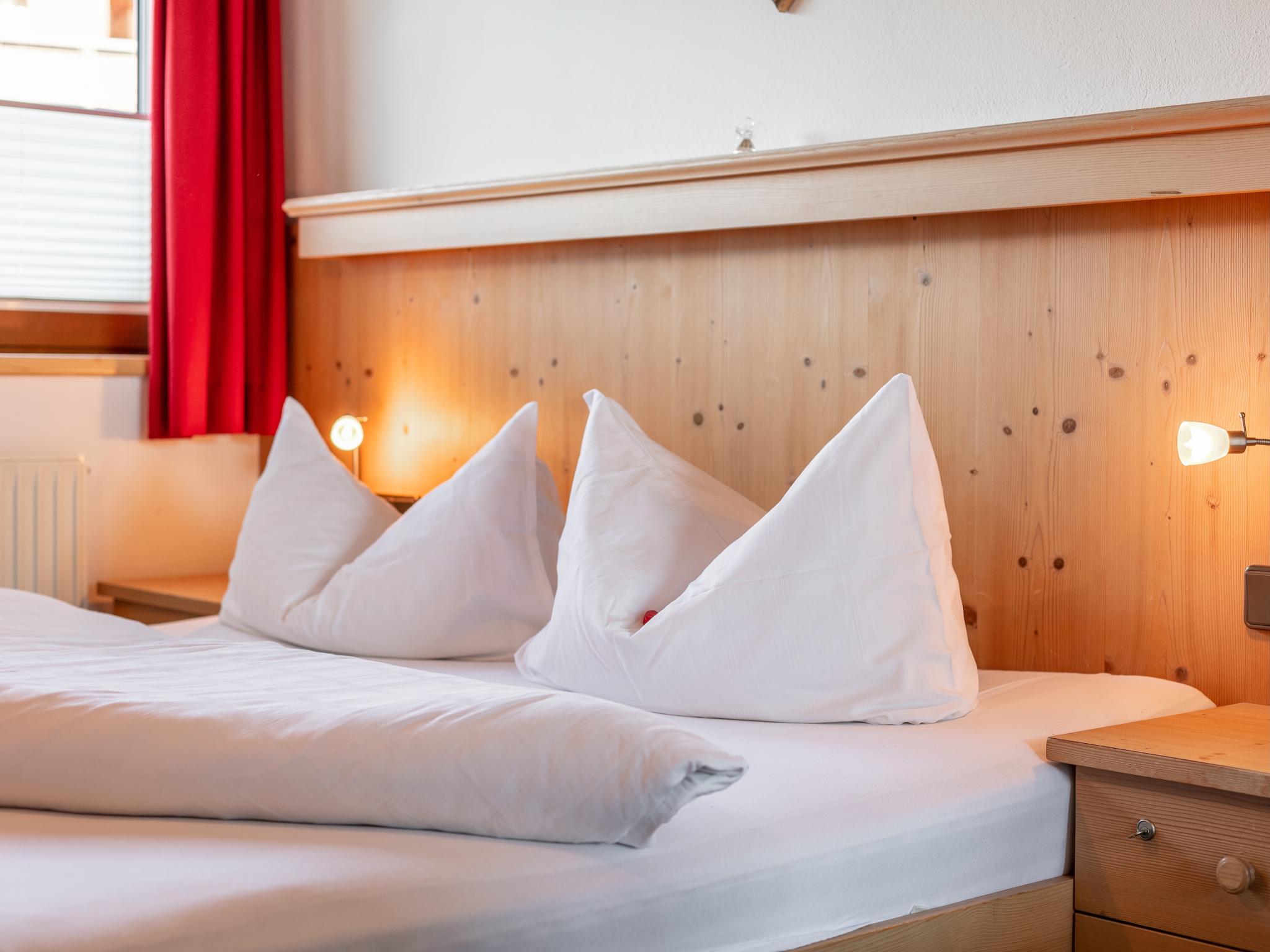 Bedroom with comfortable beds at Landhaus Marchfeld Top 4 Top 5 in Wildschönau