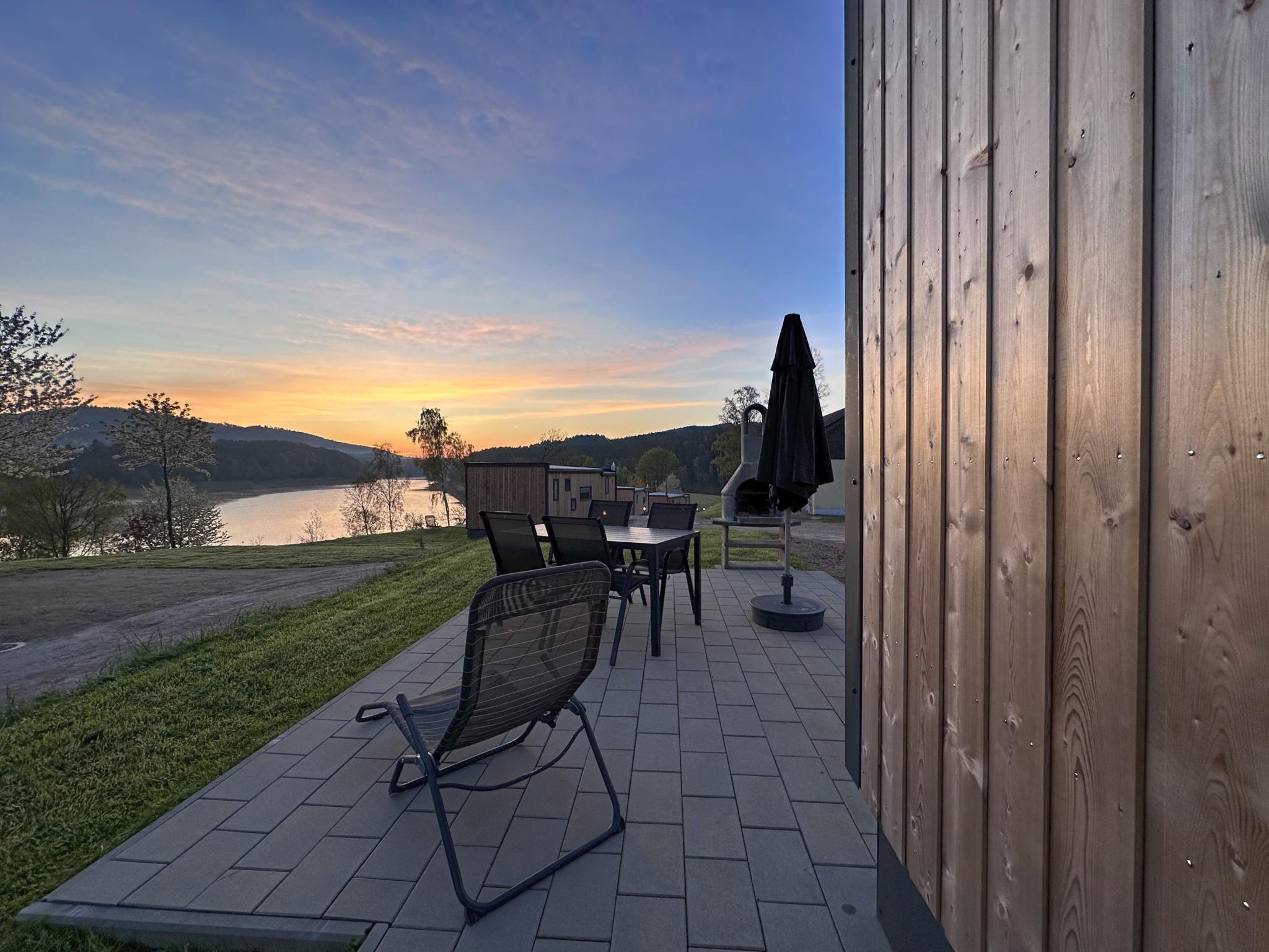 Bedroom with comfortable beds at Feriendorf Seeblick - Tiny Nr 3 in Neunburg vorm Wald