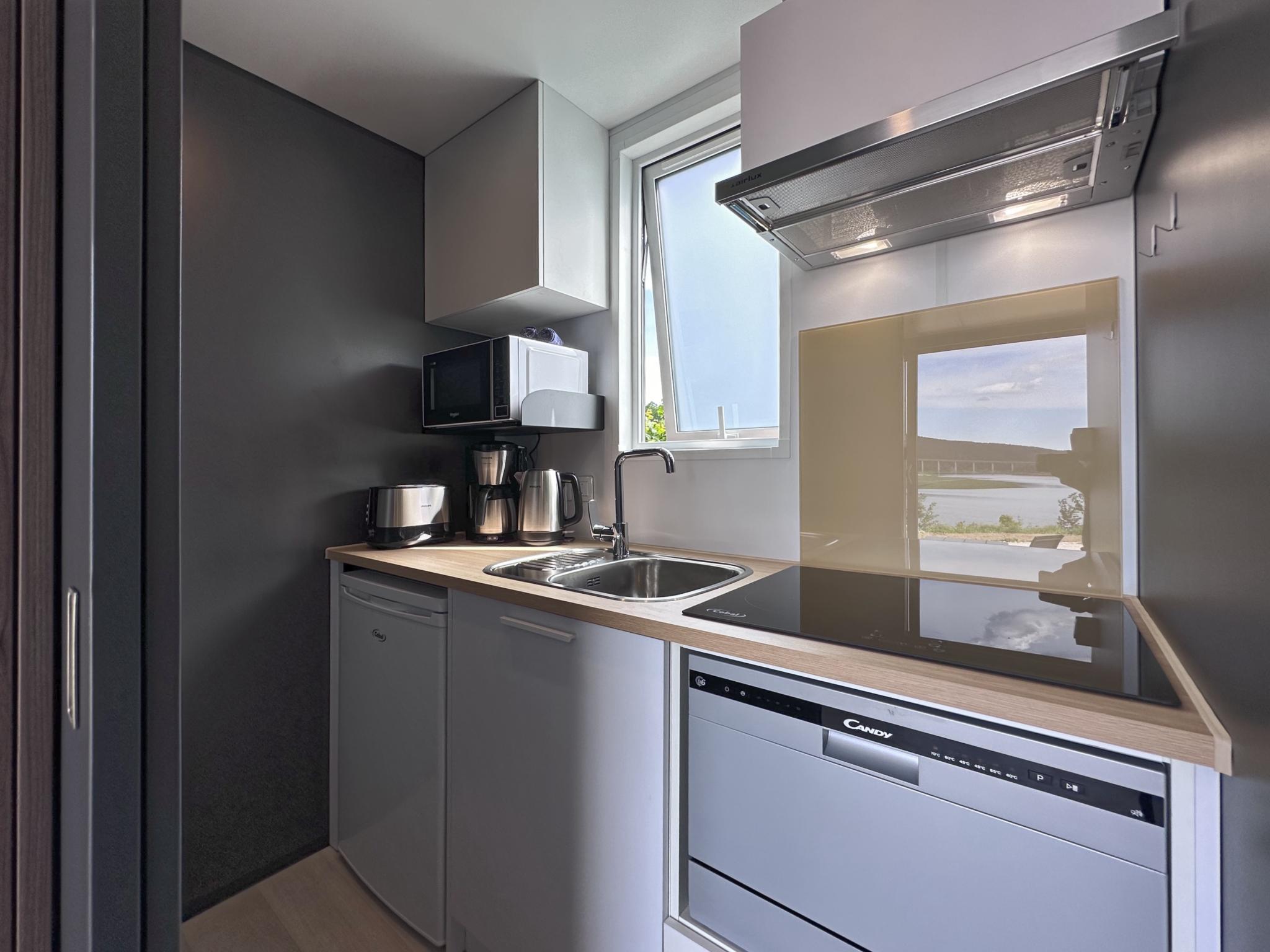 Outdoor terrace and views at Feriendorf Seeblick - Tiny Nr 10 in Neunburg vorm Wald