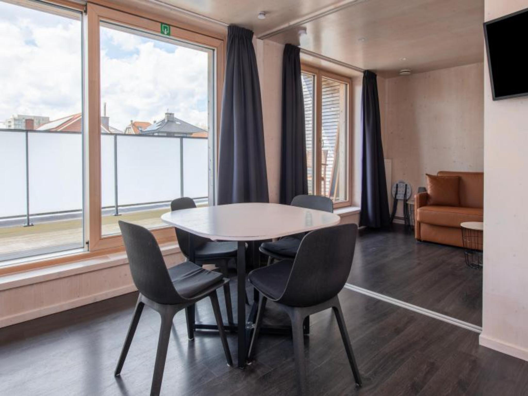 Modern kitchen at Kruiers Eco Lodge in Middelkerke