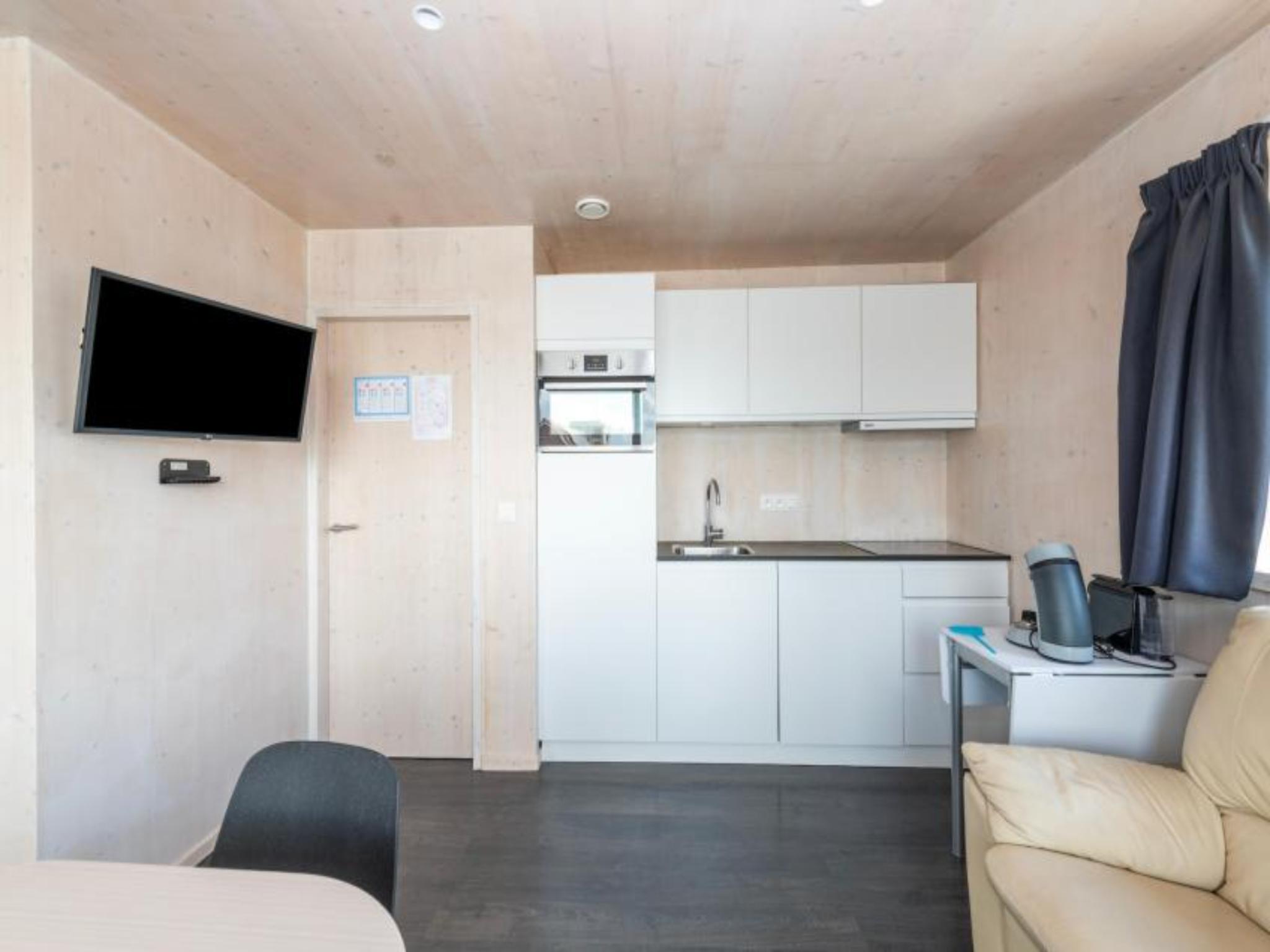 Outdoor terrace and views at Kruiers Eco Lodge in Middelkerke