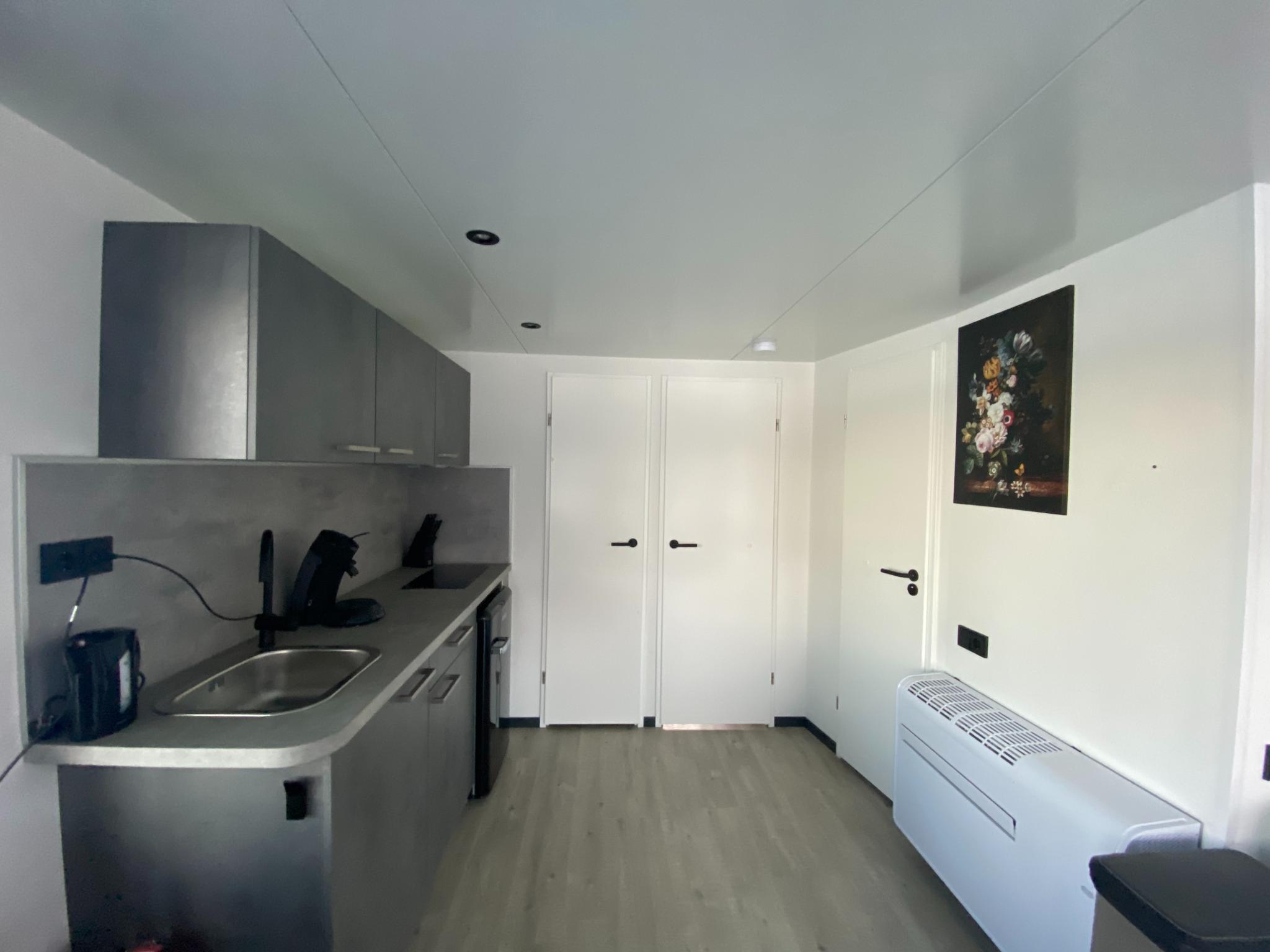 Outdoor terrace and views at Floating in Limburg - hottub in Middelaar