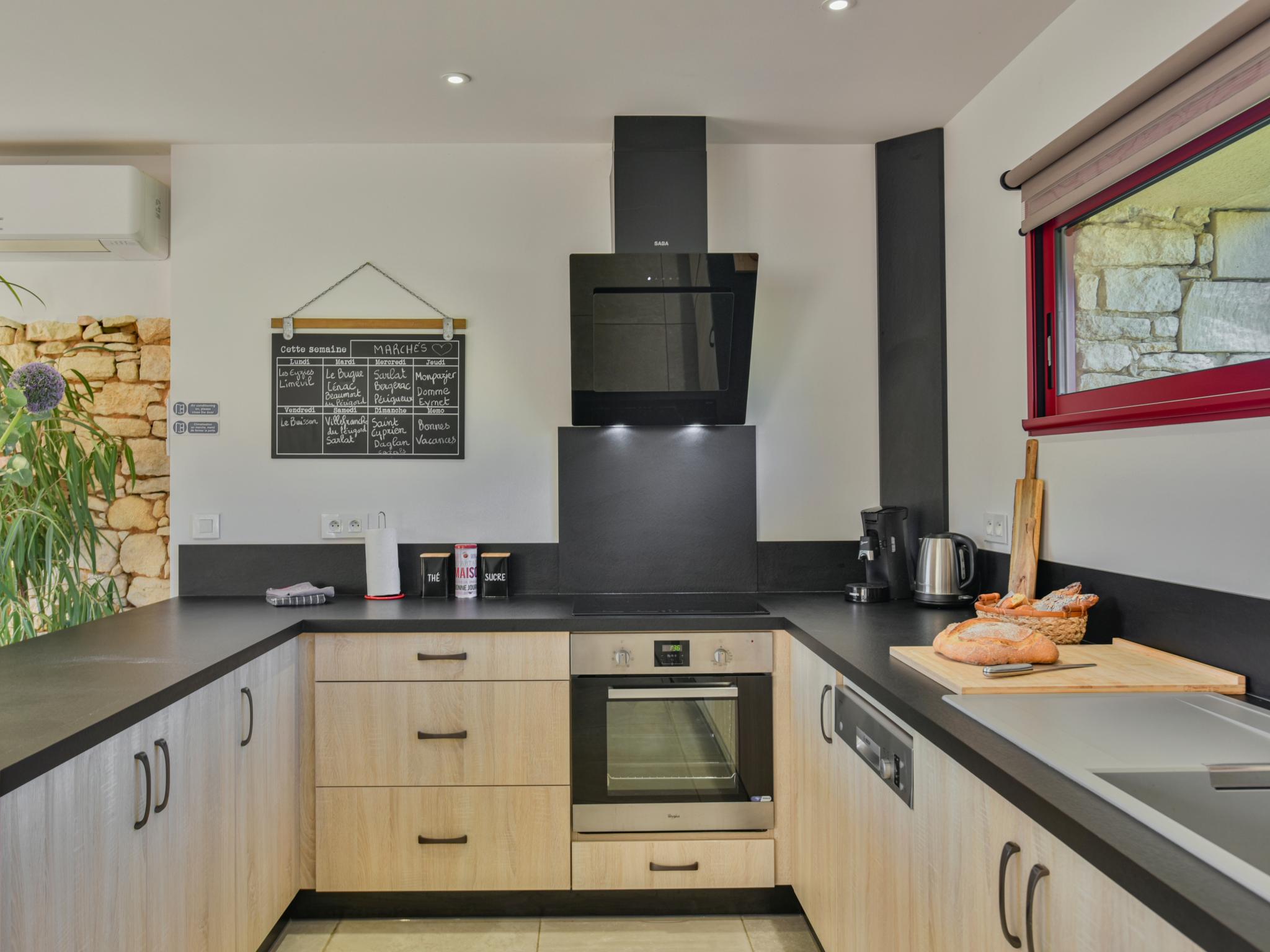 Outdoor terrace and views at Gite Constantin in Prats du Perigord