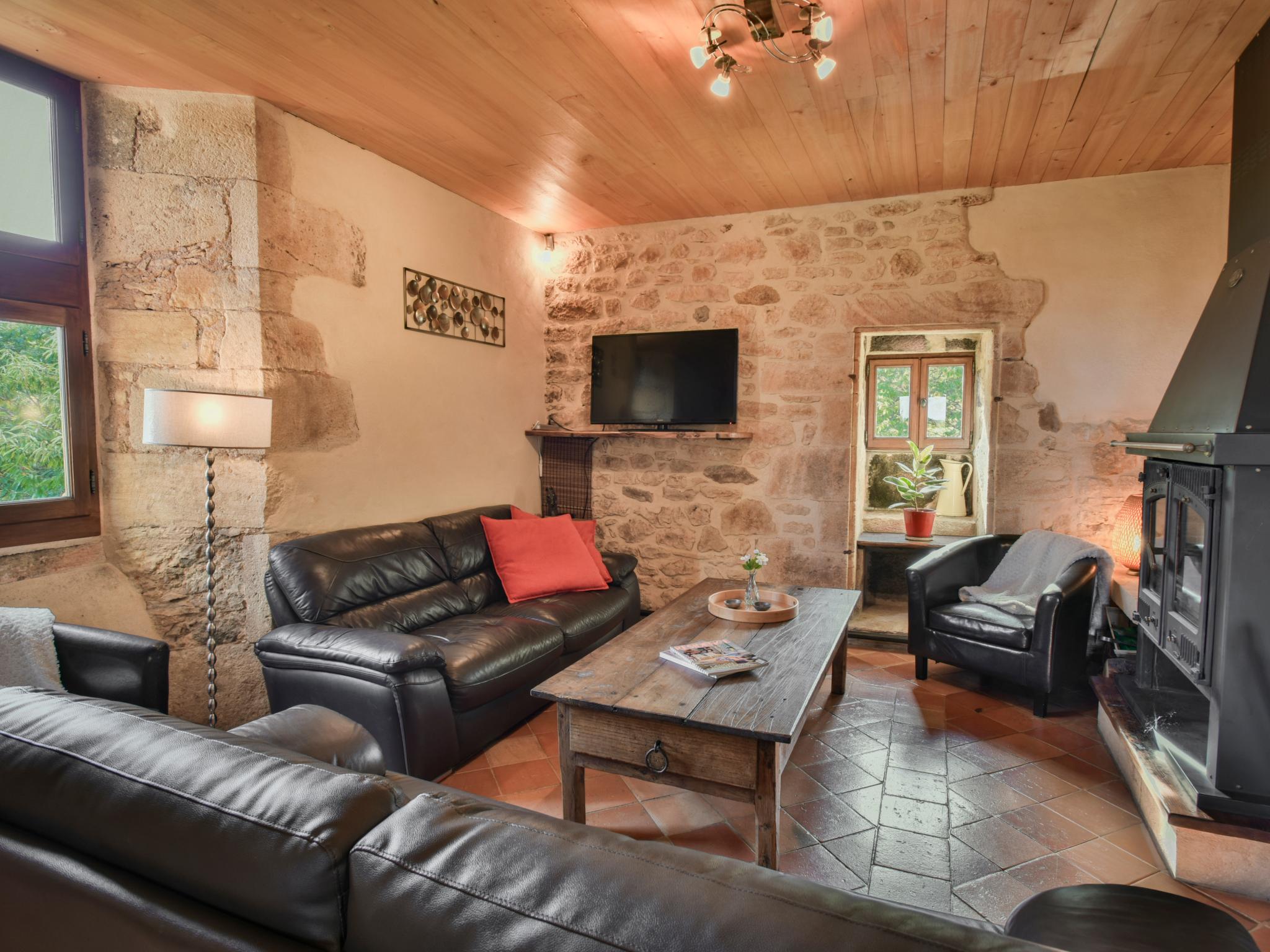 Outdoor terrace and views at La Roque Haute in Mazeyrolles