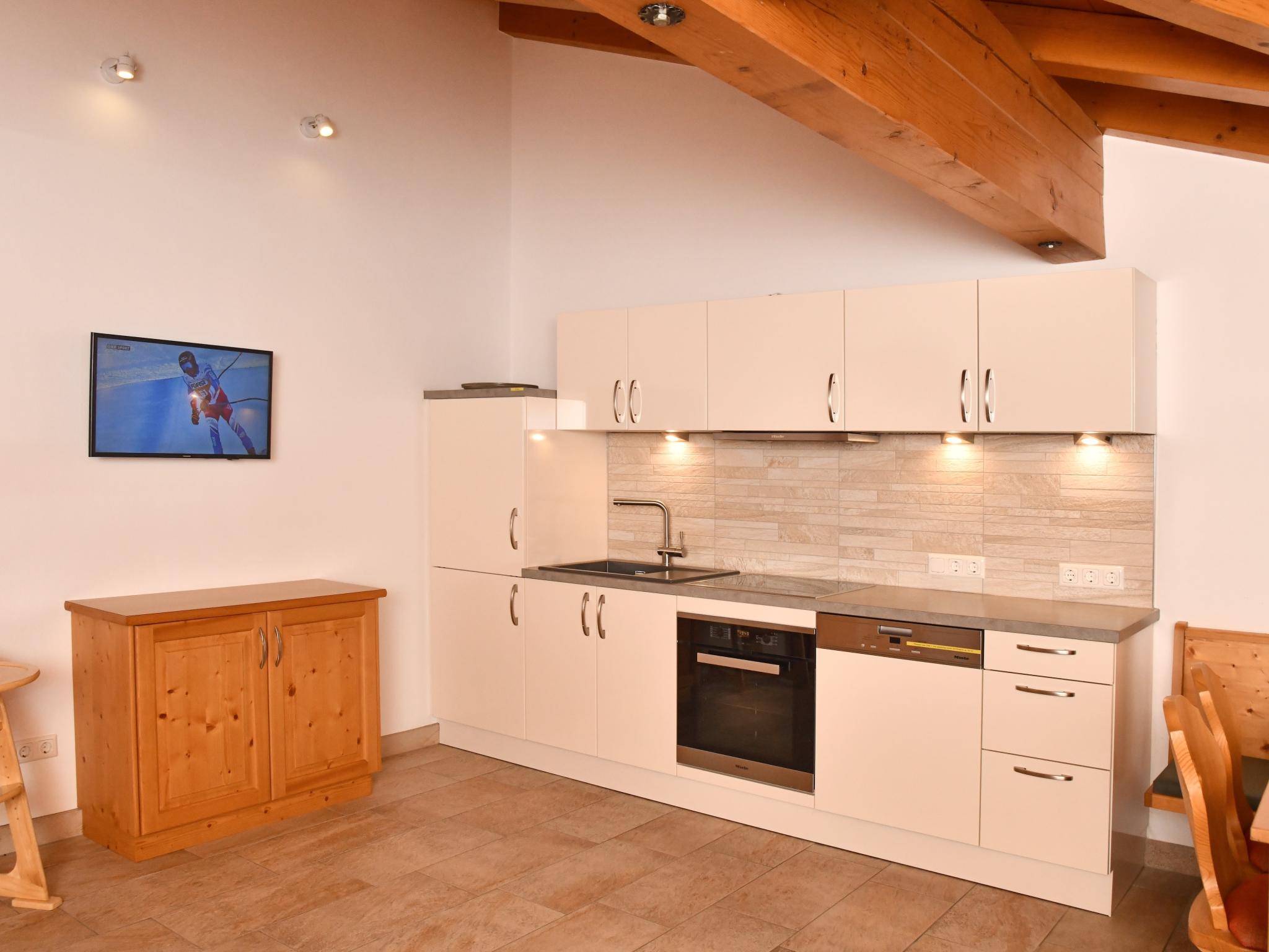 Bedroom with comfortable beds at Apartments Next To The Ski Lift PH in Brixen im Thale