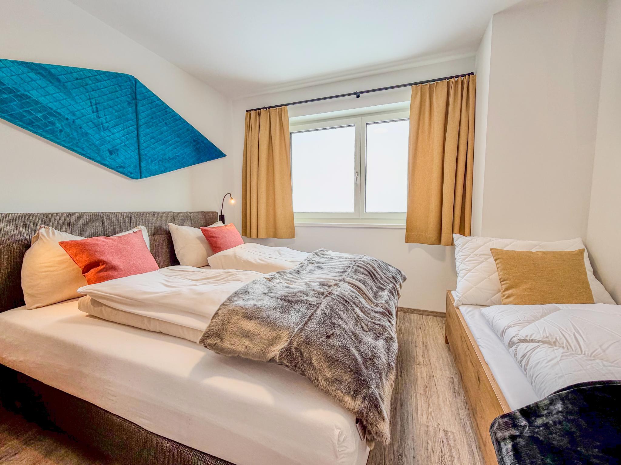 Bedroom with comfortable beds at Bockblick Top 6 in Weißpriach